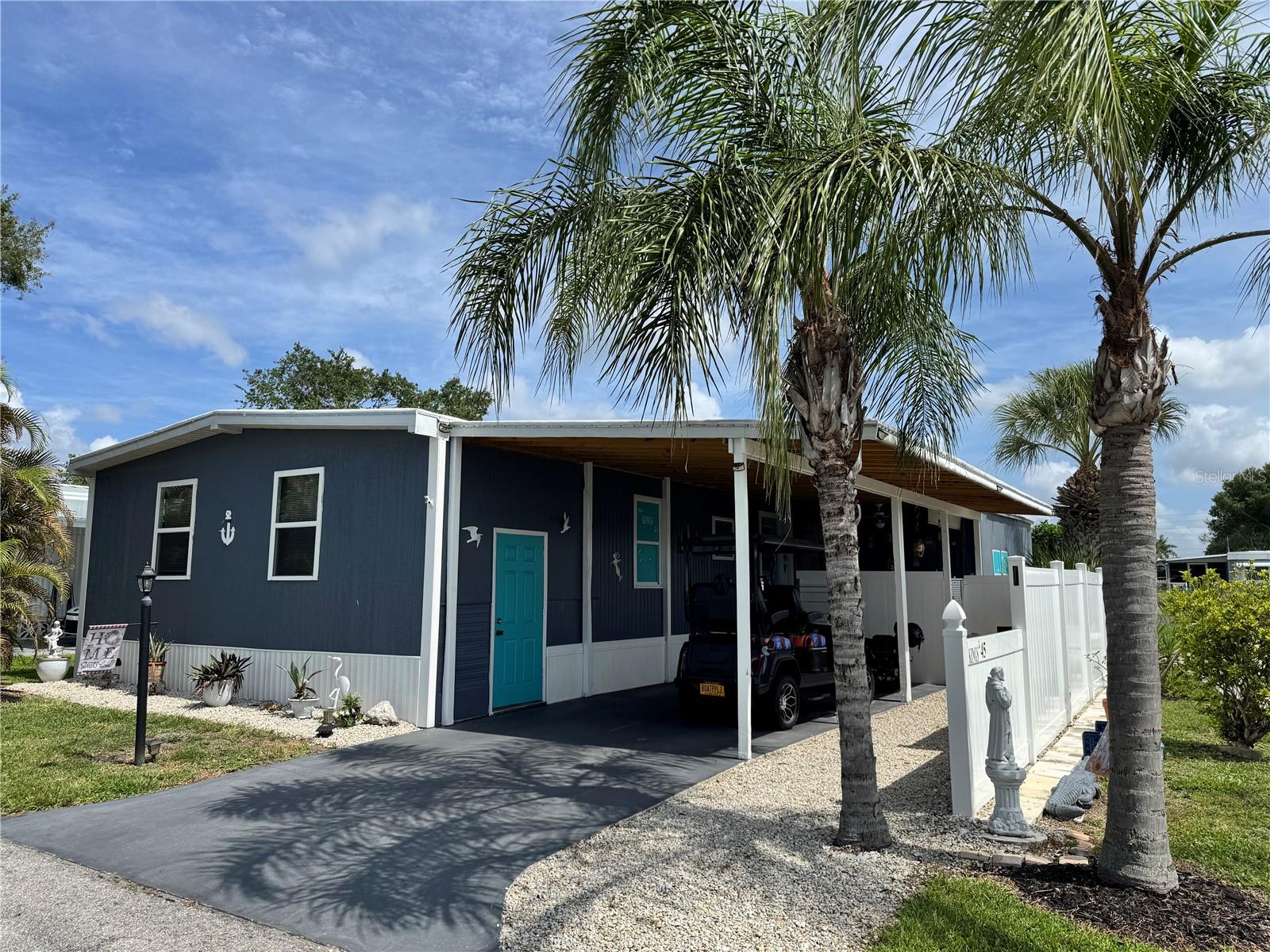 Exceptional FULLY UPDATED HOME!!! NO LOT RENT, MUST SEE. Motorcycles, golf carts, boats and service animals are welcome. Located in SKYWAY VILLAGE, a 55+ fun loving community. This 2 bedroom home has a WIDE-OPEN FLOOR PLAN. Large Florida room with private entrance and AC unit can be used as an in-law or guest suit. 2022 Updates: OPEN FLOOR PLAN, NEW SUBFLOORS, LUXURY VINAL FLOORING, NEW CARPET IN BEDROOMS, KITCHEN CABNETS, FARMHOUSE KITCHEN SINK, FACET, GRANITE COUNTERTOPS, STAINLESS STEEL APPLIANCES, LARGE ISLAND WITH BAR, GUEST BATHROOM, NEW INTERIOR/EXTERIOR PAINT, CROW MOLDING, & NEW PRIMARY CLOSET. 2023 Updates: VINAL PRIVACY FENCE, ADDITIONAL PARKING SPOT, BOAT PARKING, & NEW AIR CONDITION SYSTEM. 2024 Updates: Entire new sheet rock FLORIDA ROOM with NEW SUBFLOORS, NEW CARPET, & AC UNIT. 2025 Updates: NEW ROOF over entire home, shed and carport & MASTER BATH UPDATED. Laundry room outside and WASHER DRYER INCLUDED, WORK SHOP, & TWO CARE CARPORT. Electric bill is $100 monthly, water, sewer and trash & LAWN CARE are included in HOA FEE. Come enjoy the community pool, community fun and cruise with your golf cart throughout the community. Just 15 minutes to downtown ST PETERSBURG, 20 minutes to downtown SARASOTA and BRADENTON. 30 MINUTES TO THE BEACH!! This place is amazing, come get what you deserve, your own piece of FLORIDA