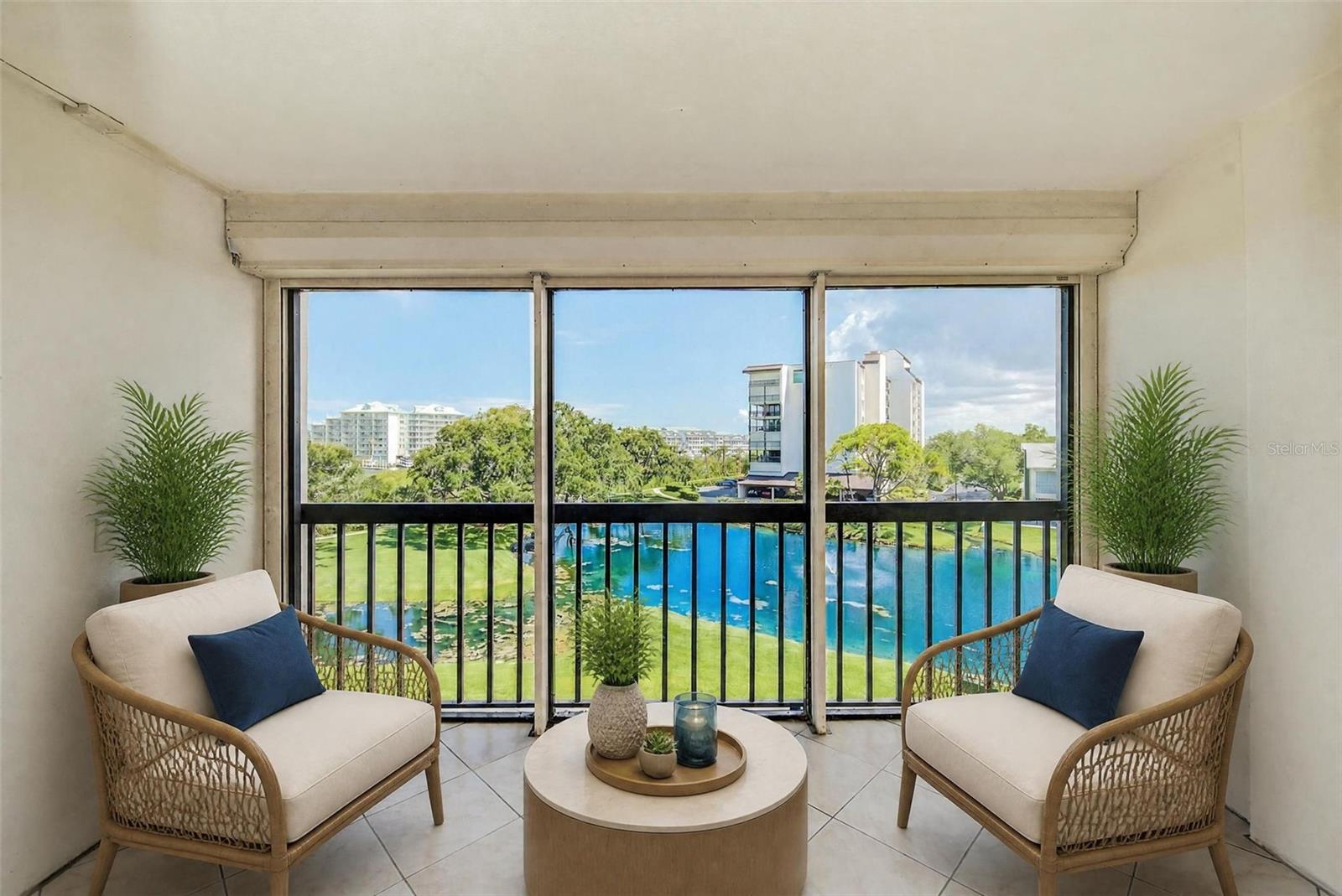 Virtually Staged. Welcome to a condo that feels like a private retreat while keeping you connected to everything you love. Bathed in natural light and thoughtfully designed for both comfort and style, this exceptional property offers the perfect balance of modern living and timeless charm. Located in the highly desirable Shipwatch Yacht and Tennis Club enclave, this neighborhood has walking trails, two pools, a fitness center, tennis, pickleball and a yacht basin. It is close to shopping, dining, parks, and all the top Tampa Bay amenities, this is more than a condo — it's a place to build memories, celebrate milestones, and truly feel relaxed. From the moment you step inside, you'll notice the spacious open-concept layout and seamless flow between living, dining and sleeping spaces. The beautifully appointed kitchen serves as the heart of the condo, featuring beautiful finishes, ample storage, and a convenient laundry closet. The primary suite provides a peaceful escape, complete with a spa-inspired bath and walk-in closet. The 2nd bedroom offers flexibility for family, guests, or a home office. Step outside on the screen enclosed porch and discover your own outdoor oasis—ideal for morning coffee, afternoon wine-down, or simply relaxing at the end of the day. Every detail has been carefully considered to create a space that is as functional and inviting. Schedule your private showing today and experience it for yourself.
