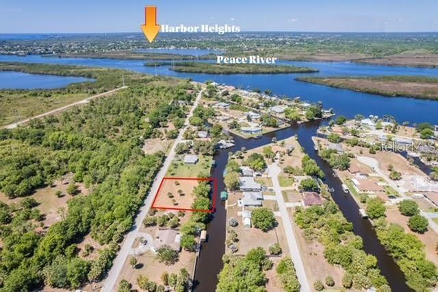 DIRECT WATERFRONT HOMESITE | PALM SHORES | PEACE RIVER ACCESS

Build your dream home on this exceptional waterfront double lot in the desirable Palm Shores community of Punta Gorda. Offering direct access to the Peace River, this property presents a rare opportunity to enjoy the ultimate Florida waterfront lifestyle with boating, fishing, and kayaking right from your backyard.

Featuring 160 feet of waterfront frontage, this homesite is ready for your custom vision.

PROPERTY HIGHLIGHTS
160 feet of direct waterfront
Direct access to the Peace River
Ideal for boating, kayaking, and fishing
Located in the sought-after Palm Shores community
BUILDING OPPORTUNITY
Perfect location for a custom waterfront residence
Plenty of space for a pool and outdoor living area
Opportunity to design your own dock and boat lift
No required timeline to build — buy now and build later
LOCATION BENEFITS
Quick access to open water via the Peace River
Minutes from downtown Punta Gorda shopping and dining
Close to parks, golf courses, and waterfront recreation
Convenient access to major roadways and Gulf Coast beaches

An outstanding opportunity to secure a prime waterfront homesite with direct river access and create the Florida lifestyle you’ve always envisioned.