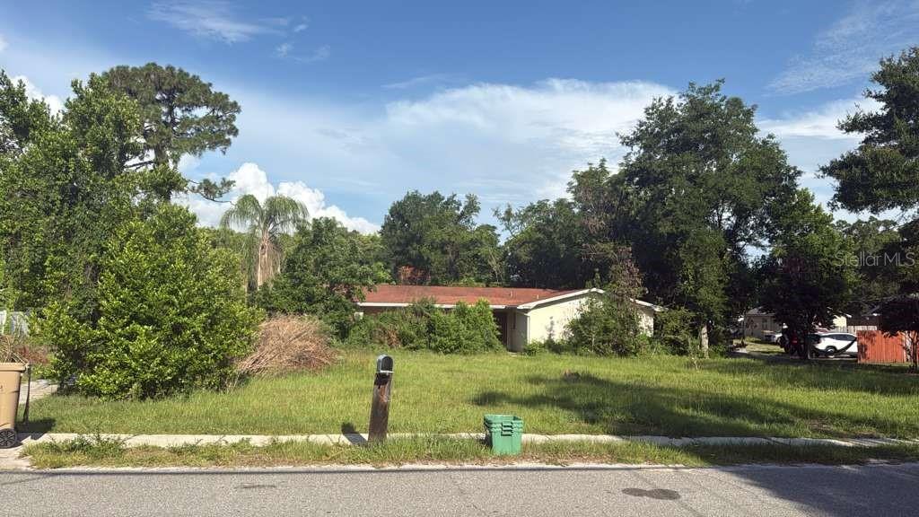 Rare opportunity to acquire an oversized 0.84-acre parcel in Temple Terrace with no HOA. Whether you're planning a full rehab, custom home, redevelopment project, or land investment, this property offers exceptional potential in an established neighborhood. The existing residence includes a converted garage, fireplace, indoor laundry room, and an in-ground pool, but the home is in poor condition and will require extensive work. The roof and HVAC system are approximately 15 years old. Cash buyers and investors are encouraged to explore the possibilities this unique property offers, conveniently located near USF, Busch Gardens, Lettuce Lake Park, shopping, dining, and major roadways.