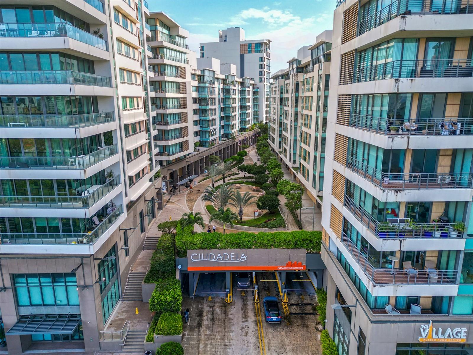 Experience vibrant city living at Ciudadela – Tower 800. This stylish, fully furnished residence offers approximately 1,100 sq. ft. of thoughtfully designed living space, featuring two bedrooms, two bathrooms, and two covered parking spaces.

The apartment boasts an open-concept kitchen, modern finishes, expansive windows, abundant natural light, and a direct view of the pool.

Located in one of San Juan’s most desirable mixed-use communities, Ciudadela offers the perfect combination of comfort, convenience, and security. Residents enjoy a swimming pool, fitness center, 24/7 supermarket, restaurants, full backup generator, and water cistern. Ideally situated near museums, restaurants, entertainment, and nightlife.

An excellent opportunity to own a move-in-ready residence in the heart of Santurce.