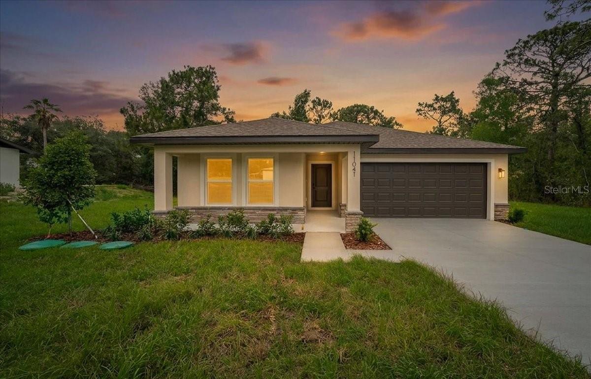 BRAND-NEW CONSTRUCTION on a spacious .45-acre homesite! This stunning 3-bedroom, 2-bathroom home stands a step above the rest, showcasing modern design, quality craftsmanship, and elegant finishes throughout. From the moment you step inside, you'll appreciate the tray ceilings, abundant natural light, and thoughtfully designed open-concept floor plan that creates a bright and inviting atmosphere.
The heart of the home is the beautifully appointed kitchen, featuring quartz countertops, rich wood cabinetry, and ample workspace, seamlessly flowing into the main living and dining areas—perfect for entertaining and everyday living. The functional layout offers both comfort and style, making this home ideal for a variety of lifestyles.
Situated on a quiet street with no rear neighbors, you'll enjoy added privacy and peaceful surroundings. Conveniently located in the desirable Spring Hill community, this home offers quick access to the Suncoast Parkway (589) for an easy commute to Tampa, while nearby Cortez Boulevard provides endless shopping, dining, and everyday conveniences. Top-rated schools, parks, and recreational opportunities are all within close reach. SELLER WILLING TO NEGOTIATE BUYER CLOSING COSTS AND INTREST RATE BUYDOWN. 
Don't miss your opportunity to own this exceptional new construction home. Schedule your private showing today!