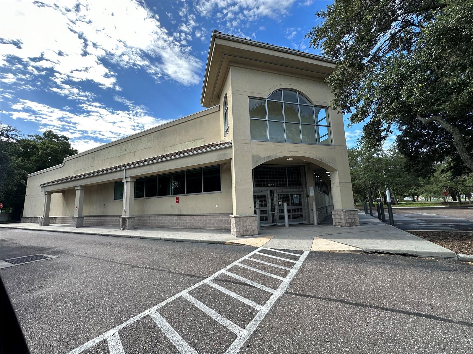 This former 15,022 SF freestanding drug store (Walgreens) is situated on a 84,366 SF (1.94 Acre) CG (Commercial General) zoned lot at the lighted intersection of Nebraska Ave and Dr Martin Luther King Jr Blvd which enjoys a combined traffic count of 35,000 VPD (both streets). The interior of the structure features high ceilings of approximately 20 ft and column spacing of 35 ft and has a covered drive through lane and ample 3-phase power. The building as also fully fire sprinklered. The site features excellent access from both Dr Martin Luther King and Nebraska Ave and boasts 67 parking spaces. Preliminary site plan approval for a "Live Local" redevelopment yielded a probable site plan of 230-250 units with 7 story height limit after a zoning & comprehensive plan change. The property sits within an Opportunity Zone, and, given the scope of the potential project, a doubling of basis would be easy to achieve. 
 ** Also available for lease

Located on N. Nebraska Avenue and E. Martin Luther King, Jr. Blvd. and close to I-275 and I-4, offering easy access to surrounding areas, including downtown.