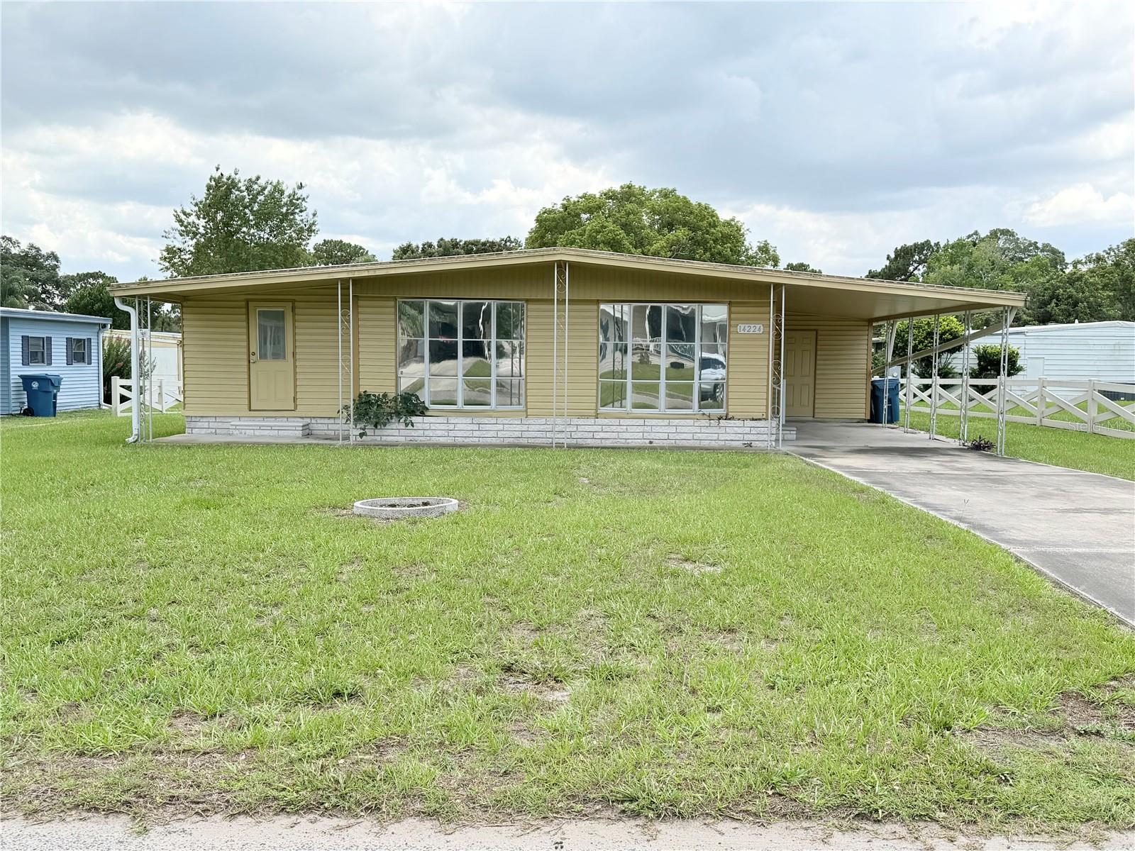 GREAT PRICE! Located in the senior golf club community of Brookridge where you own your lot and pay only 55 monthly HOA fees. Brookridge is gated and they offer a lot of activities. Located near the Weeki Wachee Mermaids and Pine Island Beach. This home has two large bedrooms, two bathrooms and a extra-large living room and enclosed lanai. It's in a quiet location but very close to lots of shopping, restaurants, medical facilities and the Veterans Expressway that gives you quick access to Tampa.