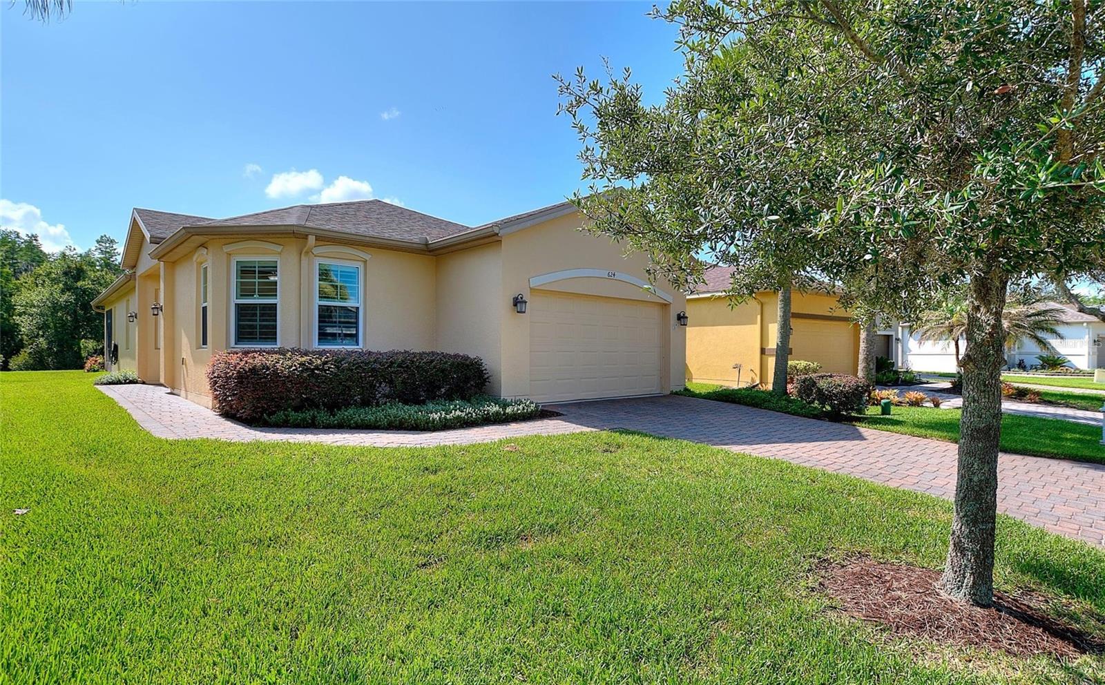 Welcome to an outstanding, tastefully upgraded Bordeaux model, a 2B/2B + Den home on a wide lot, with both canal and conservation views. As you enter the home the first thing you will notice is the gorgeous wood laminate flooring throughout the main living area, both bedrooms and the den. Quality Plantation Shutters are installed throughout the home for a warm elegant look. In 2021 all the windows including the slider to the lanai were replaced with Hurricane Impact Windows that are both WIND and IMPACT RATED. These tinted, Energy Star Rated windows not only save energy year round but provide additional peace of mind during the hurricane season. The upgraded kitchen features beautiful black granite countertops complemented by white cabinets. Optional cabinets and countertop have been added to increase the working counter space and provide more storage.  Stainless steel appliances blend perfectly into the kitchen decor with the dishwasher having been replaced in 2026. The Primary Bedroom has great canal/conservation views and features an upgraded en suite bathroom with granite countertop and upgraded shower enclosure, mirror and lighting. Dual walk in closets complete the ideal bedroom suite. Just off the great room, through the french doors, sits a perfect space for a den/office/media room. Even the hall bath has been upgraded with a granite countertop, upgraded shower enclosure, upgraded lighting and mirror.  Stepping out into the lanai you will find ceramic floor tiles giving your lanai an elegant look. The lanai is an ideal place to enjoy your morning coffee while enjoying the peaceful natural scenery.  In addition to the energy efficient windows, extra insulation has been added to the attic and a thermostatically controlled heat vent cools the garage.  The garage features a 4 foot extension and has gray/blue interlocking garage tiles for an attractive, maintenance free floor.  The water filter also sits in the corner of the garage providing filtered water to the entire home.  The ROOF was REPLACED in 2022, the HVAC was replaced in 2020, all the WINDOWS in 2021. **Please see the MATTERPORT 3D IMAGING for an immersive walk through of the home.**  Please don't delay in setting up a showing to see this upgraded and well maintained home, it may not last long!! With amenities such as 14 pools, two championship 18-hole golf courses, tennis, pickle-ball, basketball, softball, and over 240 clubs, plus spa services and two state-of-the-art exercise facilities spread across 4,200 acres of conservation, you'll have everything you need at your fingertips. Enjoy additional perks such as landscaping, irrigation, high-speed fiber internet, and TV included in the HOA. For your convenience, HCA Florida Poinciana Hospital is directly across the street along with a 42,000 square-foot medical office building. Also recently opened across the street is the new Poinciana Lakes Plaza. Here are some of the stores that have already opened: Sprouts Farmers Market, TD Bank, Outback Steak House, First Watch Restaurant, Coldstone and many, many more. Please do not hesitate to come see this gorgeous home and perhaps make it YOUR NEW SOLIVITA HOME!