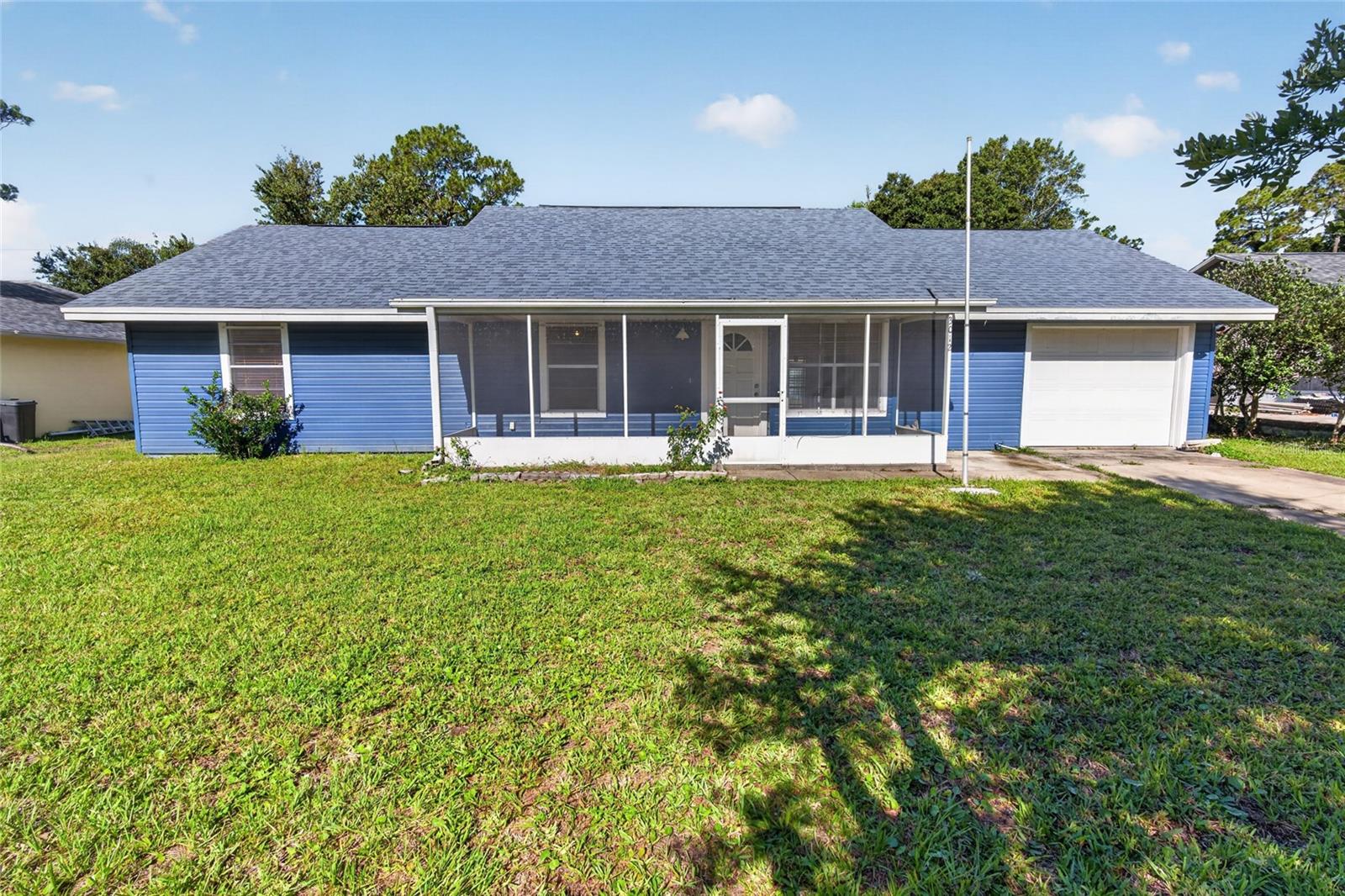 Virtually Staged. Enjoy the Florida lifestyle in this beautifully maintained 3-bedroom, 2-bath home offering 1,255 square feet of living space in the sought-after Florida Shores community of Edgewater. Situated on a spacious lot, this move-in-ready property features numerous updates, including a newer roof and A/C, an updated kitchen with wood cabinetry, and low-maintenance vinyl siding.

The outdoor space is just as impressive, featuring two storage sheds and a large covered carport with plenty of room for a boat, trailer, or recreational equipment. Whether you need extra storage, workshop space, or room for your outdoor hobbies, this property delivers.
Conveniently located just minutes from the beautiful River, you'll have easy access to boating, fishing, kayaking, and waterfront parks. Plus, the beaches, shopping, and dining of New Smyrna Beach are only a short drive away.

Offering comfort, functionality, and a prime location near the water, this home is an exceptional opportunity at $289,000.