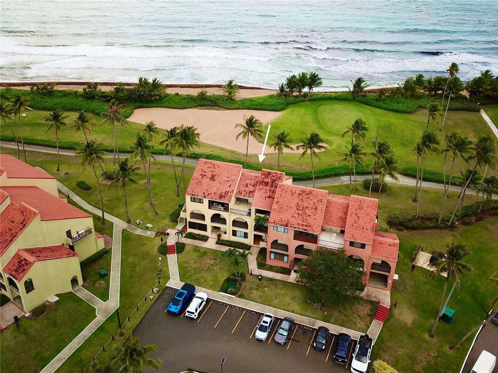 Wake up to uninterrupted ocean views in this charming 864 sq. ft. split-level one-bedroom villa, just steps from the beach.The upper level features a convenient laundry area and a full bathroom. Downstairs, the open-concept layout includes the kitchen, inviting living area, and a spacious master bedroom—all oriented toward the ocean so you can enjoy sweeping water views from every corner of the villa. Step out onto your private balcony and take in the sound of the waves and the endless horizon—perfect for morning coffee or sunset unwinding.