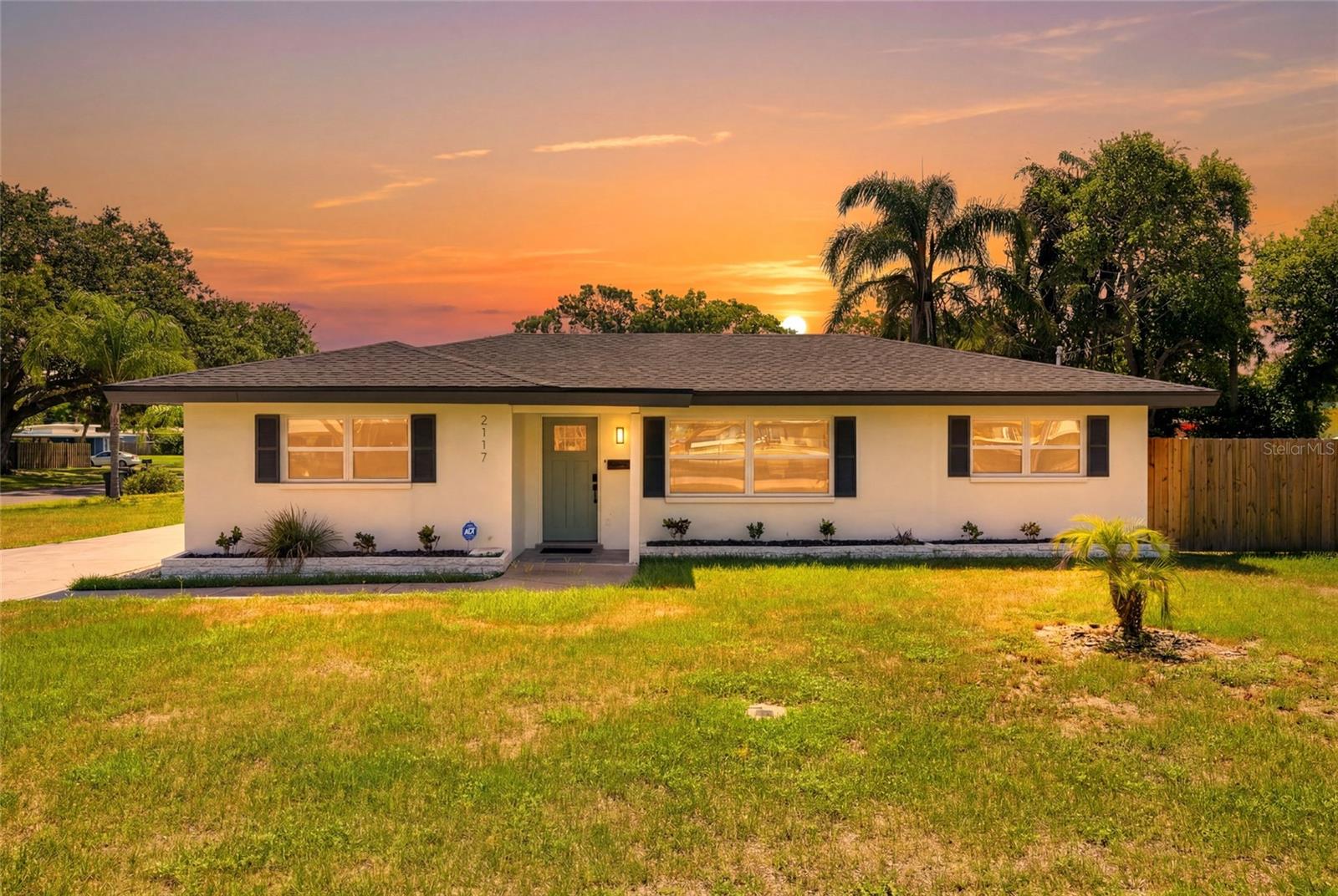 2117 N Hercules Ave, Clearwater, FL — a corner-lot stunner, freshly updated and ready to go.

This 1,275 sq ft home is proof that good things come in well-renovated packages. Spacious corner lot? Check. Sun-drenched living space? Check. Open-concept layout made for hosting (or just spreading out after a long day)? Also check. And if you're not in the mood to shop for furniture — good news, this one can come fully furnished. Move-in day just got a whole lot easier.

Inside you'll find 3 bedrooms and 2 fully renovated bathrooms, including a primary suite that actually feels like a suite — his-and-hers closets and an updated ensuite bath included. The kitchen's been given the full glow-up too: newer appliances, renovated cabinets,and fresh countertops.

Out back, a screened-in patio is calling your name for morning coffee, evening wind-downs, or stashing your sandy beach gear before it infiltrates the house. The yard's a solid size too, thanks to that corner lot, and it's newly fenced — so the dog, the kids, or just your peace of mind are covered.

Aesthetics aside, this home boasts plenty of functionality-- new roof, water heater, and HVAC — all 2024 — plus newer windows, flooring, kitchen, and bathrooms throughout. Translation: nothing to worry about for years. And since this one sits high and dry outside the flood zone, you can skip the flood insurance stress altogether.

Location-wise, you're zoned for great schools and just minutes from Clearwater Beach, Dunedin, and every shopping/dining spot you could want.

Schedule your showing now and watch yourself fall in love with 2117 N Hercules Ave.