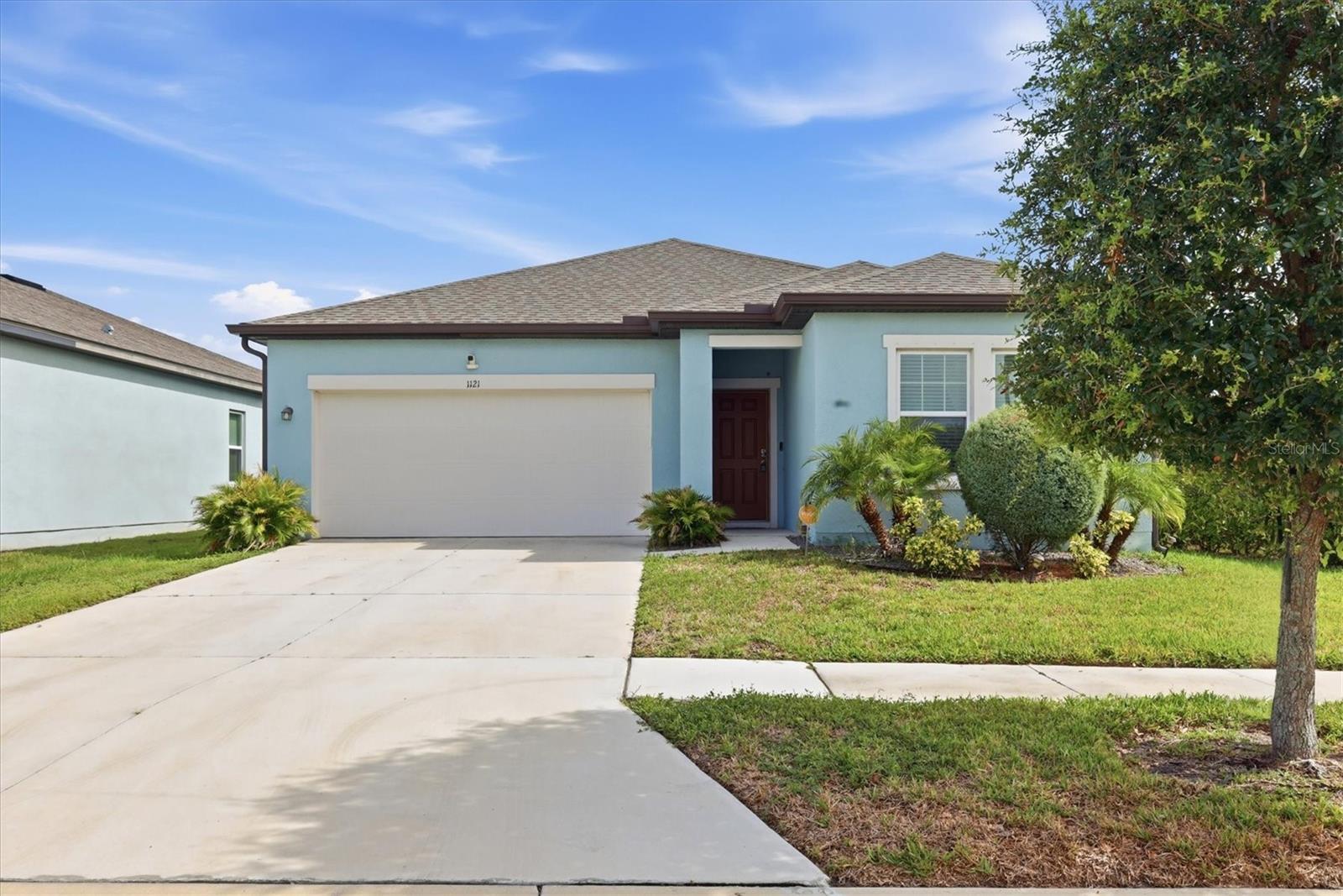 Just Listed! Better than new and impeccably maintained, this move-in ready home offers the perfect blend of modern style, comfort, and convenience. Featuring three bedrooms and two baths, the flexible floor plan allows one of the bedrooms to serve as a home office or comfortable guest room.

The bright, open-concept living area flows seamlessly into a well-appointed kitchen with modern appliances, abundant cabinetry, and generous storage throughout. The spacious primary suite features a large walk-in closet, a step-in shower, and a private water closet for added comfort.

Additional highlights include an attached garage, dedicated laundry room, ceiling fans, alarm system, rain gutters, and a covered, screened lanai overlooking a backyard with room to relax or entertain.

Located on a desirable corner lot in the growing community of Shell Point, residents enjoy amenities including a community pool, dog park, and neighborhood park. With convenient access to major highways, shopping, dining, and waterfront attractions, this home offers an exceptional Florida lifestyle.

Don't miss this opportunity to own a beautifully maintained, move-in ready home that truly is a must-see!