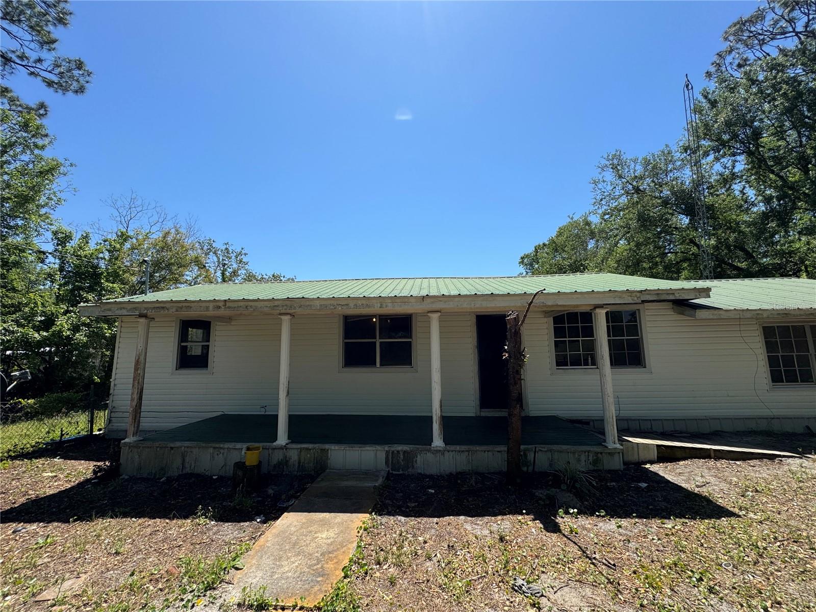 Beautiful home in the country side, with lots of space, adding a free In law suite, private entrance, a lake in backyard, also have a chicken house, and a house for horse.Lot has back fence, on the left side of the property is a wooded land, 3.68 acres land for this home, Newly r renoovated with brande new appliances. Come to take a look of this dream home.  Side with right neighbor is not fenced, but it is very easy to do.  There are couple benches sitting by the lake.