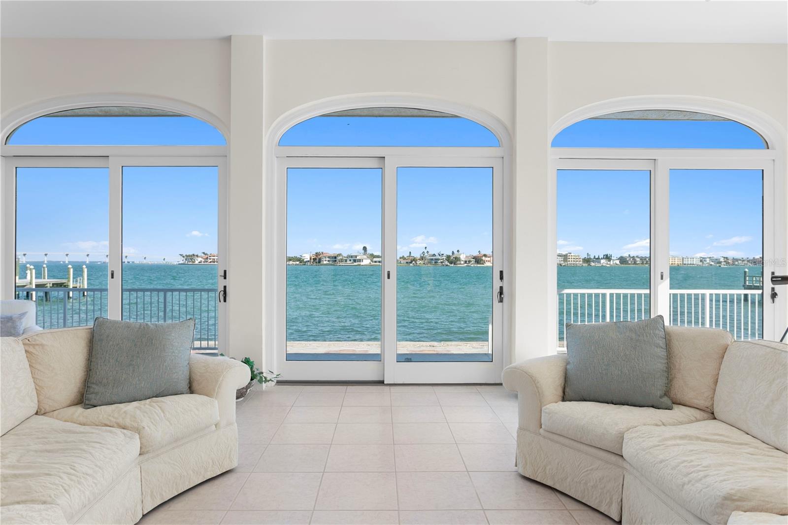 Location, Location, Elevation on Vina Del Mar Island plus 99ft of waterfrontage on Pass a Grille Channel.  If you love first floor living, love the craftsmanship and materials used when building mid century homes, this may be your perfect piece of Paradise.  However, if are you looking for that unique waterfront lot to build your dream home with 7ft++ elevation, this is an opportunity to seriously consider. Situated on the very sought after southern end of this private waterfront community south of the Don CeSar (SOTD) with the only access on and off the island via Historic Pass A Grille. You'll love waking each morning to amazing sunrises! No bridges and just minutes to the Gulf provides for one of the best boating locations in Pinellas. Premier fishing off your dock if you're the Cook your Catch fishing enthusiast! This home was one of the original homes built on Vina with terrazzo floors, cedar closets and oversized bedrooms to accommodate multi-generational living or lots of guest space you will surely enjoy hosting.   Vina del Mar has a wonderful park with Tennis and Basketball courts, playground and dog park. Whether you choose to walk, bike or take the golf cart, there are so many fun things to do. Old fishing village style restaurants, charming boutiques, the Yacht Club and of course the spectacular white sandy beaches in Pass a Grille. Easy access to Downtown St Petersburg to enjoy trendy restaurants and fabulous museums. Tampa Int'l is a quick 35 min drive making business or casual travel a breeze.