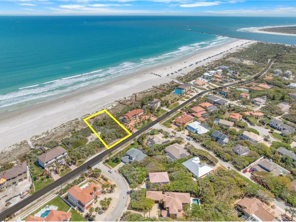 SPECTACULAR OCEANFRONT 1.39 ACRE VACANT LOT WITH 120' OF PRIME OCEAN FRONTAGE LOCATED ON THE PRISTINE 'NO DRIVE' SUGAR SAND BEACH IN THE BEAUTIFUL & TRANQUIL COASTAL ENCLAVE OF PONCE INLET! Discover this extraordinary opportunity to own a remarkable stretch of oceanfront property on the pristine white sand 'no drive' beach. This impressive parcel boasts 120' of direct ocean frontage with expansive shoreline views and endless design possibilities. Build your coastal dream home and secure a valuable asset for the future. This awesome property delivers both an elevated coastal lifestyle and lasting investment potential. The neighboring oceanfront lot is also available (4861 S. Atlantic Ave. - MLS #1224784) presenting a unique chance to create a truly grand estate or multi-generational retreat that can be enjoyed for years to come. Experience the magic of oceanfront living every day--breathtaking sunrises, soothing wave sounds, refreshing sea breezes, and the scent of salt air refreshing your mind, body & soul. Ponce Inlet is cherished for its unspoiled serene beaches, relaxed atmosphere and connection to nature. This charming coastal community offers a peaceful alternative to crowded destinations while still providing convenient access to a wide range of activities. Enjoy nearby attractions including the historic lighthouse & jetty park, waterfront dining with live entertainment, boating, marinas, charter fishing, surfing, kayaking, scenic parks, nature preserves, museums, and even a dog-friendly beach. Secure your slice of paradise along one of Florida's most beautiful coastlines.