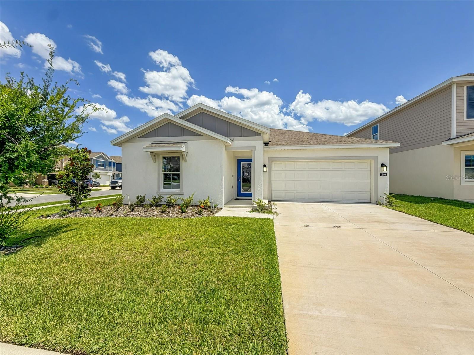Why wait to build when you can own this never-occupied former model home in the highly sought-after community of Peace Creek Reserve? Offering the ease of new construction without the wait, this beautifully designed single-story residence blends comfort, style, and functionality throughout.

The spacious open-concept layout seamlessly connects the family room, dining area, and gourmet kitchen—perfect for both everyday living and entertaining. The kitchen showcases 42" upper cabinetry, stainless steel appliances, quartz countertops, and an island with seating. A sliding glass door extends the living space outdoors to the patio, providing the perfect opportunity to create your own private outdoor oasis.

The owner’s suite is thoughtfully positioned at the rear of the home for added privacy and features a generous walk-in closet and a spa-inspired bath complete with dual vanities, a walk-in shower, and private water closet. Two additional bedrooms and a well-appointed guest bathroom offer ideal space for family or overnight guests. A two-car garage provides ample storage for vehicles and recreational items, while a dedicated laundry room enhances everyday convenience.

Residents of Peace Creek Reserve enjoy resort-style amenities, including a community swimming pool and a family-friendly playground, all set within beautifully maintained natural surroundings.

Ideally located in Winter Haven, the area offers a vibrant lifestyle surrounded by scenic lakes, parks, and recreation centers. Home to the world-renowned LEGOLAND® Florida Resort and a variety of dining, shopping, and outdoor experiences, Winter Haven delivers year-round activities for residents of all ages.