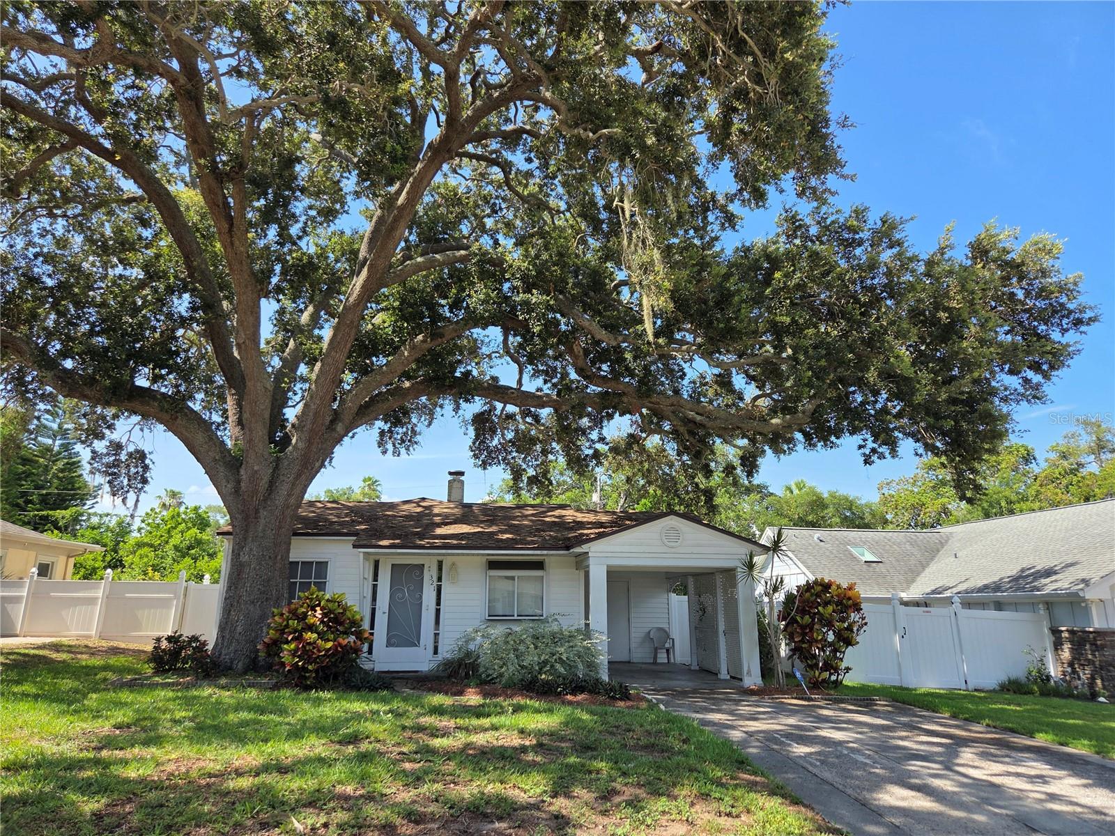 Wonderful opportunity in the town of Belleair and a chance to live in one of the area's most desirable neighborhoods. This charming home is nestled perfectly on a serene street, just steps away from the Belleair Country Club. The 2 bedroom, 1 bathroom home awaits your personal touches and sits on a deep private lot with plenty of room for potential future expansion and a pool/outdoor living space. Belleair is where Old Florida charm and prime location perfectly intersect, offering world class golf and country club amenities with stunning bluff and water views, pristine parks and events, a community and recreation center, beautifully manicured streets and a blend of exclusive privacy and elegance. Close proximity to local shopping and restaurants, and a short drive to both Belleair Beach and Clearwater Beach, this community truly offers the best of it all.