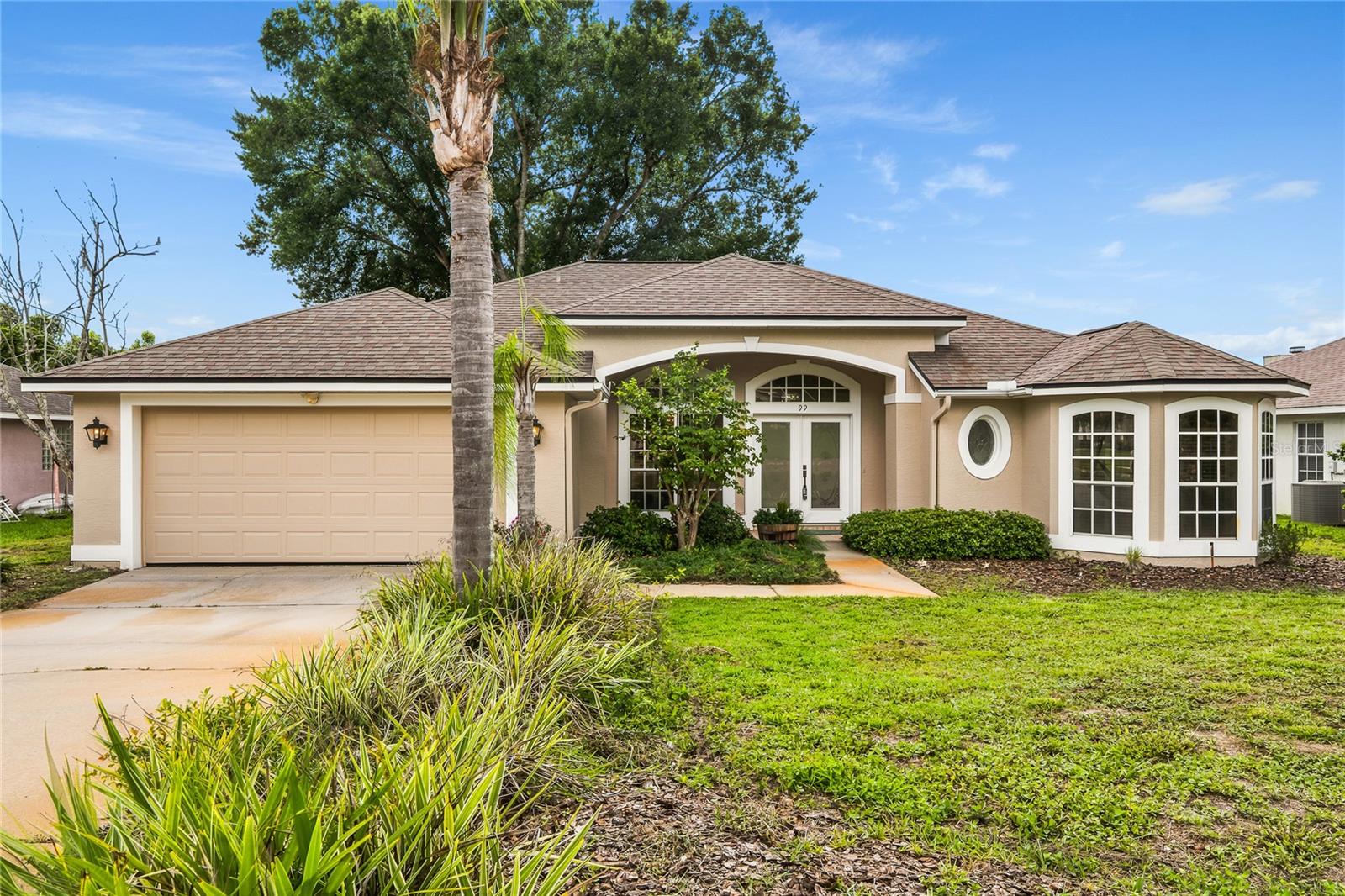 FRESH. Comfortable. Ready for its next chapter.
Welcome to 99 Hollow Pine Drive in the established DeBary Woods community! Fresh interior and exterior paint and beautiful new flooring create an inviting first impression, while the vaulted ceilings and two sets of sliding glass doors fill the home with natural light.
The kitchen is designed for everyday living with natural gas cooking, recessed lighting, a tile backsplash, and walk-in pantry. Just beyond, the family room offers the warmth and charm of a natural gas fireplace, creating a welcoming space to gather.
The spacious primary suite is a true retreat, featuring shutter style treatments, a large walk-in closet with built-in shelving, dual sinks, a relaxing garden tub, separate shower, and a convenient pocket door for added privacy.
The secondary bedrooms include mirrored closet doors, and the laundry room offers upper cabinetry, a utility sink, and additional storage. Practical touches like storage above the garage door make everyday organization easy.
Step outside to the large screened lanai with no rear neighbors—the perfect place to enjoy your morning coffee, entertain friends, or simply relax and enjoy Florida’s beautiful weather.
Located just minutes from shopping, dining, SunRail, Gemini Springs, the St. Johns River, and major highways, this home offers the perfect blend of comfort, convenience, and privacy.
Come see why 99 Hollow Pine Drive feels like home.