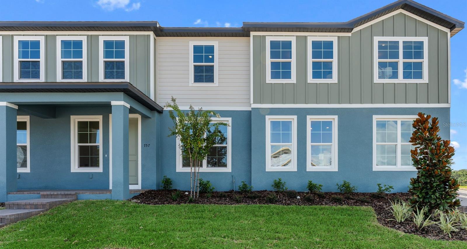 Under Construction. Estimated Completion: October 2026. Located in Apopka’s desirable Eden Crest community, this thoughtfully designed 4-bed, 3.5-bath Amity Townhome sits on a prime corner lot with an oversized two-car garage and paver driveway. Enjoy the conveniently situated first floor primary suite, with the luxury of an additional guest suite upstairs. Enter through the impressive 8' front door and step into a bright, open-concept layout featuring 9'4" ceilings, and luxury vinyl plank flooring throughout the first floor. The spacious kitchen, dining, and great room flow seamlessly, perfect for everyday living and entertaining. The first-floor primary suite offers a private retreat with a dual-sink vanity, a floor-to-ceiling tiled shower with glass enclosure, and a generous walk-in closet. The gourmet kitchen is both stylish and functional, showcasing Truffle stained 42" cabinets, sleek quartz countertops, and an oversized center island ideal for gathering. The light-filled great room and dining area overlook your private 24' x 15' paver courtyard, perfect for relaxing or hosting guests, with convenient access to the garage. Upstairs, enjoy a spacious loft ideal for a media room, home office, or homework space, along with a full laundry room, guest suite, third full bathroom, and 2 generously sized bedrooms. As a resident of Eden Crest, you'll enjoy resort-style amenities including a zero-entry pool, shaded cabana with grills, dog park, scenic walking trails, and lawn maintenance included offering low-maintenance living in a beautifully designed community. Ask about our closing cost incentives! DISCLAIMER: Photos and/or renderings are for illustrative purposes only and may depict upgraded landscaping, elevations, decorative features, or optional upgrades that may not be included in the home offered. Pricing, Incentives and Promotions are subject to change at anytime. Promotions cannot be combined with any other offer. Ask the Sales and Marketing Representative for details on promotions.