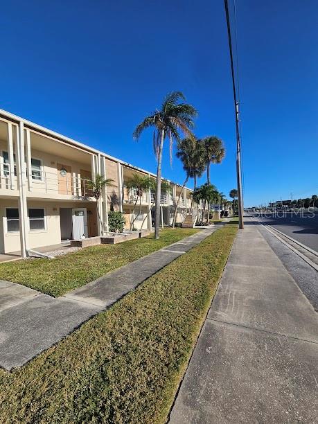 Great buy on this 55 + Condo with 1 Bedroom, 1 Bath condo. Ready to move in! On the second so no worries about flooding! View of canal from bedroom. Extra room off bedroom, office or TV room, and carport. New windows and brand-new electric thru out whole building. Just minutes from shopping and the beach. Publix, Walgreens, and Restaurants just 1 block away.