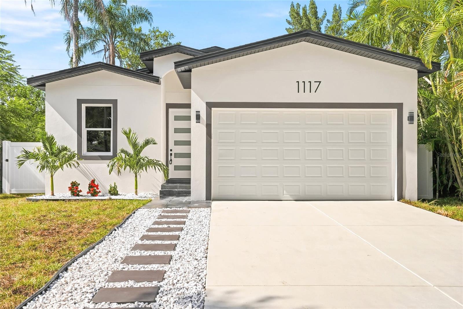 New Construction in Largo!

Welcome to 1117 15th Ave NW — a stunning brand-new 3-bedroom, 2-bathroom home offering 1,760 sq ft of thoughtfully designed living space, just minutes from the Gulf beaches. Step inside to an open-concept floor plan bathed in natural light, with soaring ceilings that create an airy, spacious feel throughout.

The kitchen is designed to impress, featuring upgraded cabinetry, premium countertops, and modern finishes that flow seamlessly into the living and dining areas — perfect for entertaining or everyday living. The split-bedroom layout offers privacy for the owner’s suite, complete with a private en-suite bath and an oversized walk-in closet large enough to double as a dressing room.

Additional highlights include a 2-car garage, brand-new systems and appliances, and quality craftsmanship throughout — no expensive updates needed for years to come.

Enjoy direct access to the Pinellas Trail right outside your door — just steps away for biking, walking, or jogging — plus easy access to Largo Central Park and the boutique shops and restaurants of nearby Belleair Bluffs and Clearwater, with the Gulf beaches just a short drive away.