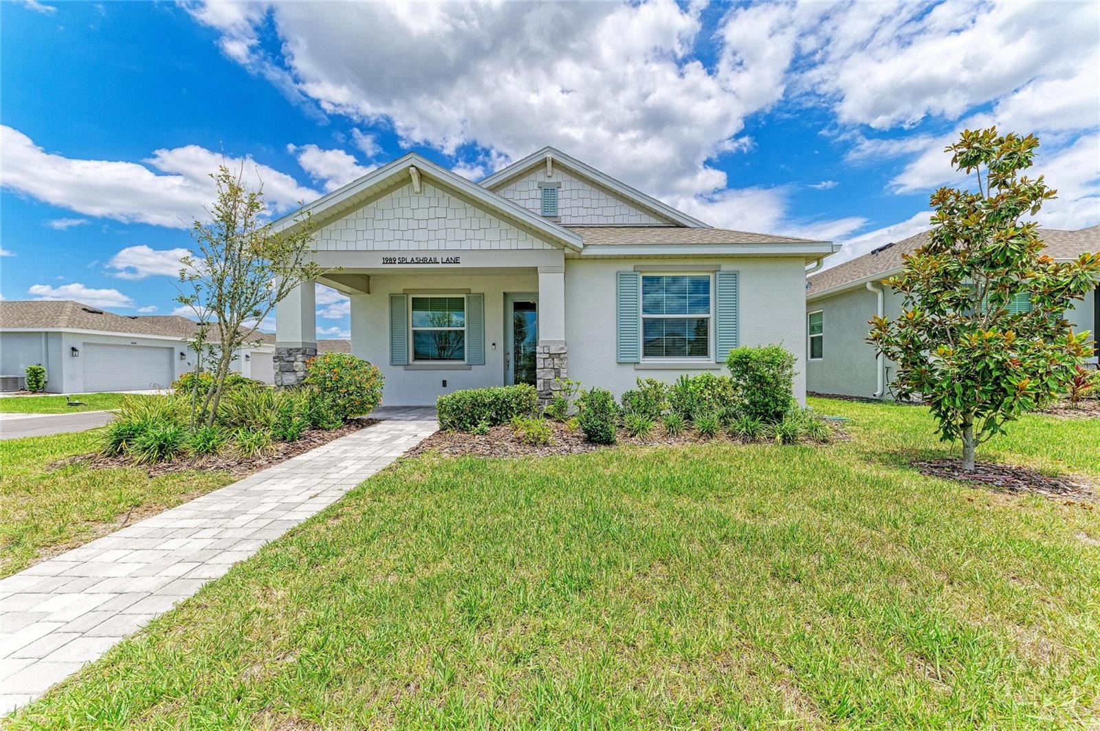 Welcome to an exceptional lakefront-inspired retreat in Nautique at Waterside, where luxury, comfort, and
an unmatched lifestyle come together in one of Sarasota's most sought-after communities. This beautifully
designed 3-bedroom, 2-bath residence with a versatile flex room offers partial views of scenic Kingfisher
Lake and showcases thoughtful upgrades throughout.
The open-concept living space is both elegant and inviting, featuring a gourmet kitchen with quartz
countertops and a custom quartz backsplash that creates a seamless, sophisticated design. Every room,
except the kitchen, is enhanced by premium Big Ass Haiku smart ceiling fans (52" and 60"), controlled by
remote or smartphone app, providing exceptional comfort and modern convenience. Impact-resistant
windows offer added security, energy efficiency, and peace of mind.
Designed to embrace Florida's indoor-outdoor lifestyle, the home features a welcoming front porch and a
private side patio, ideal for enjoying morning coffee, evening cocktails, or entertaining guests. The flexible
bonus room can easily serve as a home office, media room, fitness studio, or additional guest space to suit
your needs.
Residents of Nautique enjoy resort-style amenities including a lakeside pool and cabana overlooking
Kingfisher Lake, pickleball courts, a dog park, and a playground. A standout feature of this community is the
private dock with water taxi service to Waterside Place, providing effortless access to waterfront
restaurants, boutique shopping, live entertainment, yoga on the lawn, and the popular weekly farmers
market.
Perfectly positioned within the vibrant Waterside district of Lakewood Ranch, this exceptional residence
offers a rare opportunity to enjoy luxury living, modern technology, and a true resort-inspired lifestyle in
one of the Gulf Coast's most desirable destinations.