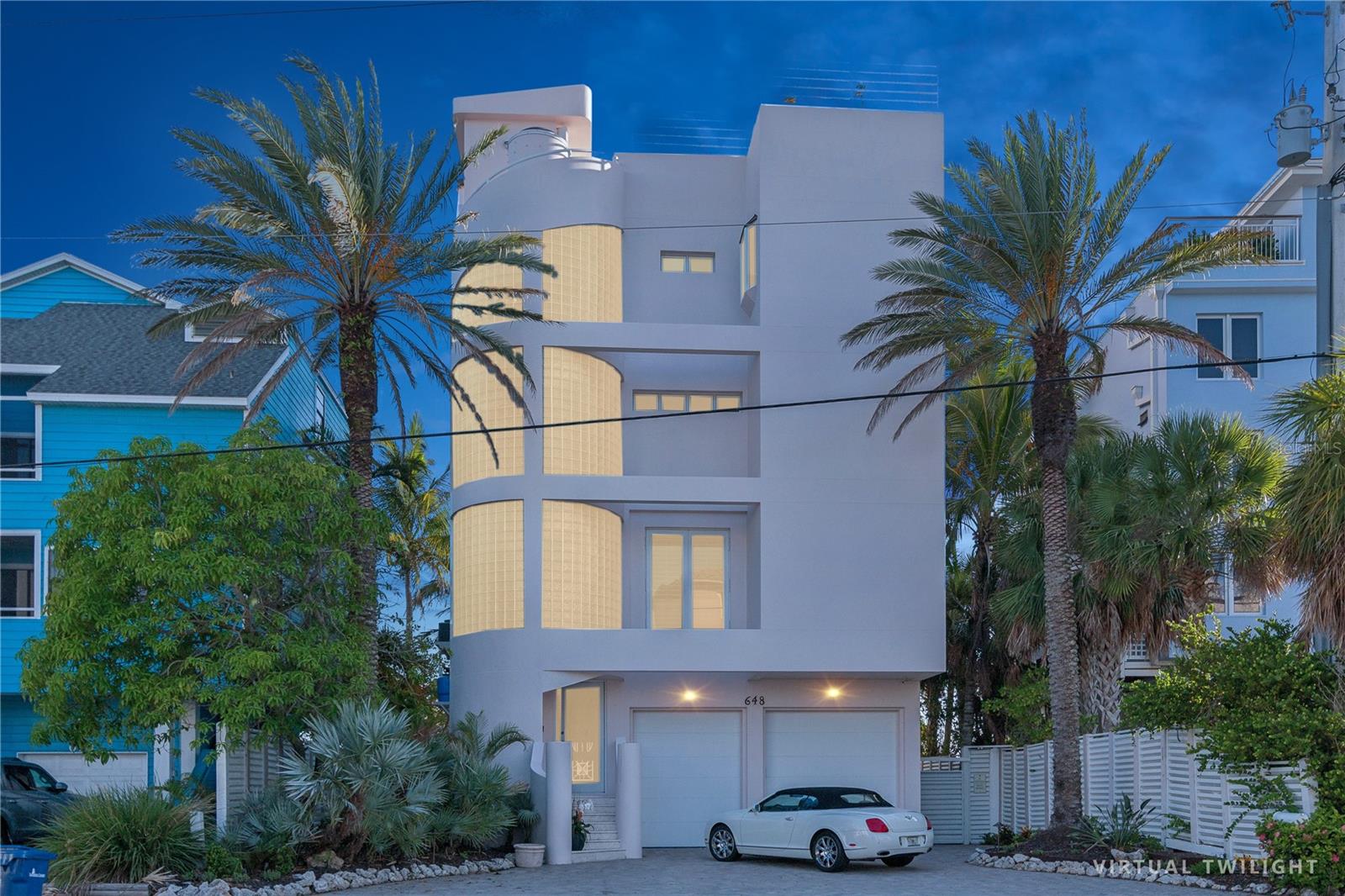 Welcome back to 648 Beach Road, you’ve seen it before, but it’s better than ever. Reconstructed, reimagined, and elevated in every detail, this extraordinary residence delivers the same breathtaking, front-row views you remember… with an entirely new feel that’s fresh, refined, and built for the way you live now. 

This expansive three-bedroom retreat lives like a private resort, with the space to convert to a five-bedroom, perfect for hosting, creating office space, or adding guest suites without sacrificing flow. Step outside to a wraparound terrace on every floor, designed for sunrise coffees, sunset cocktails, and everything in between, because when your backdrop is this spectacular, indoor/outdoor living isn’t a feature, it’s a lifestyle. 

Ride your private elevator to the top and discover the ultimate luxury: a private rooftop pool where the horizon becomes your daily view and the sky feels like it belongs to you. Add in a rare four-car garage, and you have a true coastal statement home, spacious, secure, and effortlessly impressive. 

648 Beach Road isn’t just a comeback. 
It’s a glow-up, with the views you loved, and the home you’ve been waiting for.