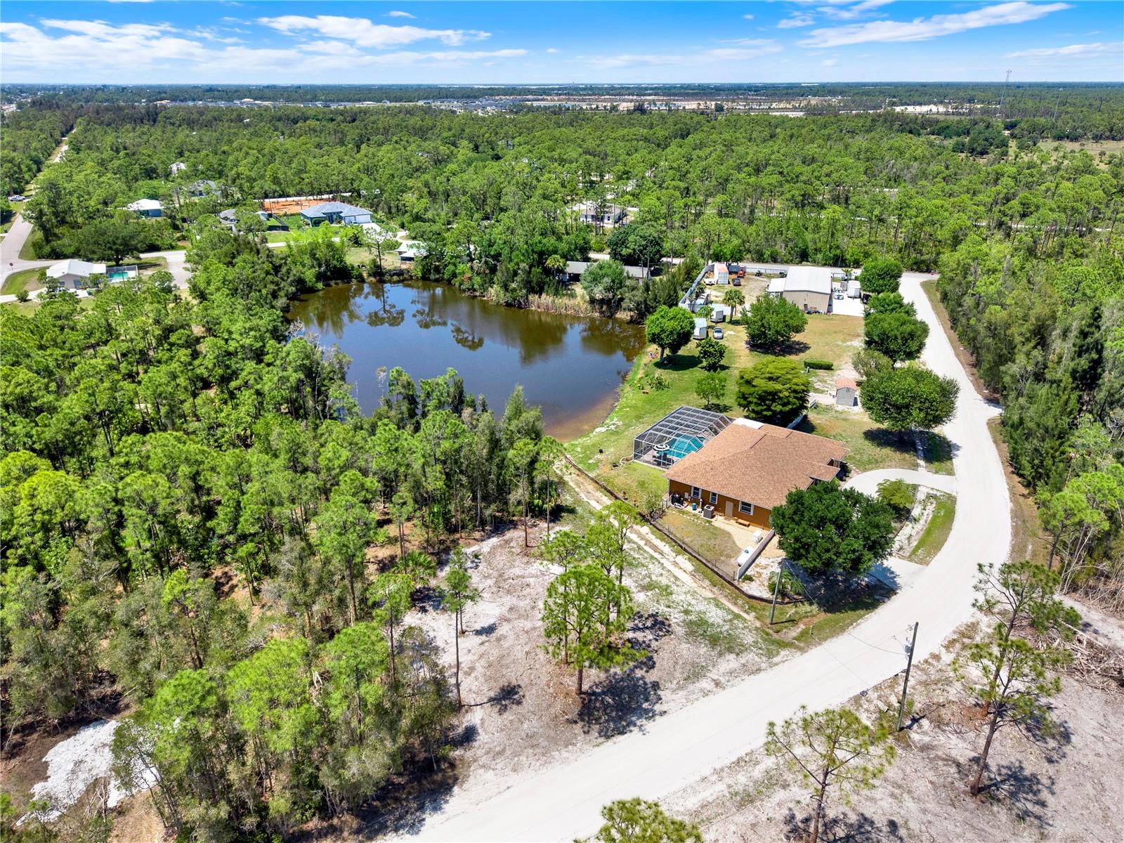 Introducing Tropical Gulf Acres Waterfront Paradise — welcome to your dream retreat in the peaceful community of Tropical Gulf Acres, a hidden gem conveniently located between I-75 and US-41. This exceptionally rare waterfront property showcases stunning northeastern views overlooking a charming small lake, complete with a large fishing pond that makes it a perfect escape for anglers and nature lovers alike.

 Key Features

Scenic Water Views
This partially cleared waterfront lot features some of the longest and most beautiful shoreline views among the buildable parcels in Tropical Gulf Acres. Enjoy the calming atmosphere and sparkling lake scenery right from your future homesite.
Peaceful Living
Leave the hustle and bustle behind and embrace the quiet beauty of nature. This property offers the ideal setting for a relaxing and tranquil retreat surrounded by serene waterfront surroundings.