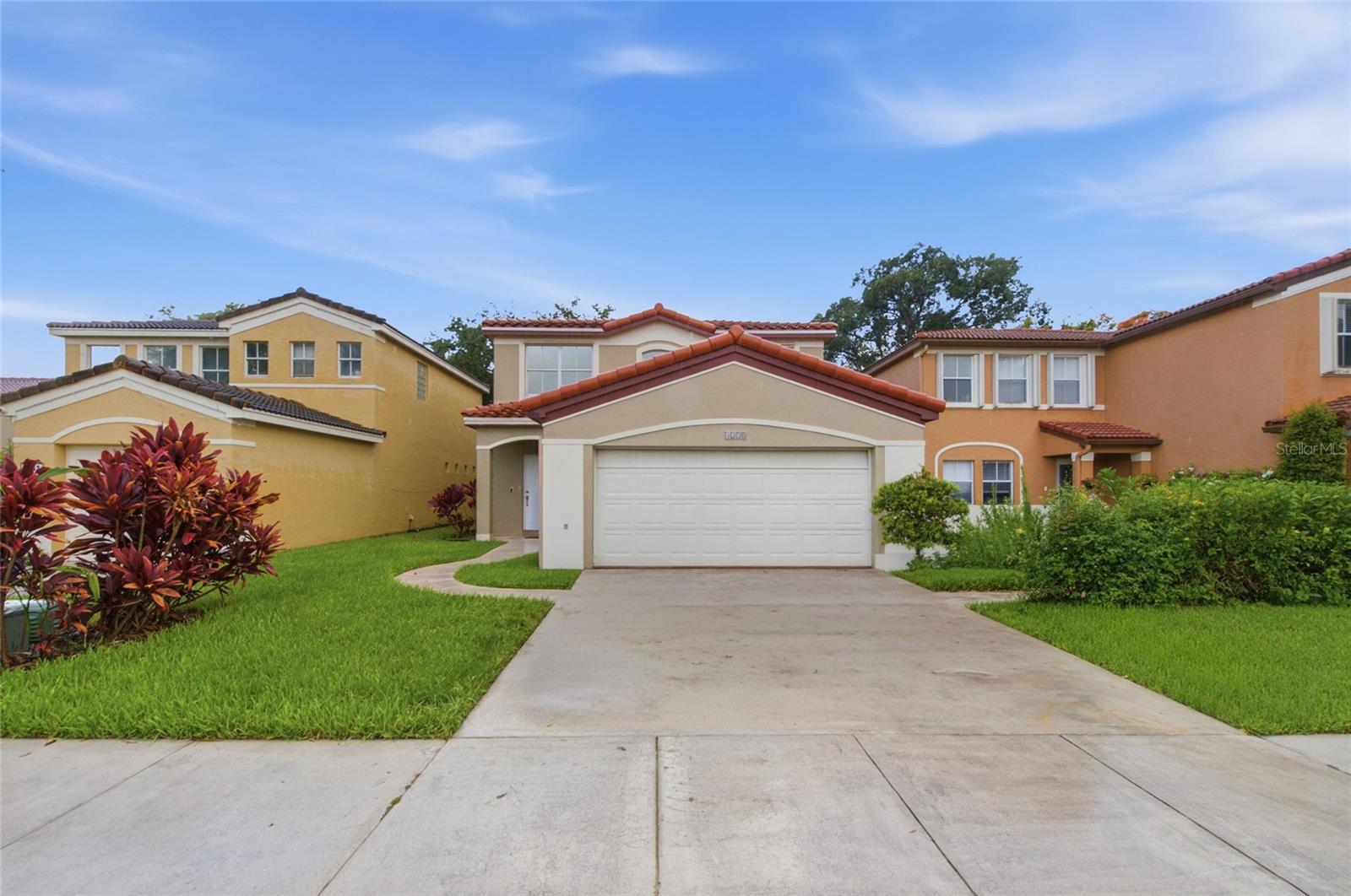 Discover one of the best values in Deerfield Beach! Your home awaits in the highly desirable gated community of Hammocks at Riverglen. This move-in ready 4-bedroom, 2.5-bath residence with a 2-car garage is a rare find. Enjoy stunning lake views overlooking a wide green common area, offering the perfect setting for relaxation, entertaining, or outdoor family fun. The oversized screened patio extends your living space and enhances the Florida lifestyle year-round. The community features a low HOA fee and includes a pool and playground. Ideally located within a great school district, just minutes from Deerfield Beach, shopping, dining, parks, and major highways including I-95, the Florida Turnpike, and Sawgrass Expressway, this home offers both convenience and lifestyle. Pet-friendly and perfectly situated, opportunities like this are rarely available. This one won’t last—schedule your private showing today!
