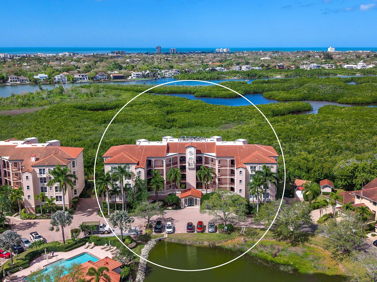 Virtually Staged. Experience the relaxed elegance of life in Eagles Point at The Landings, where beautiful waterfront surroundings, vibrant amenities, and breathtaking sunsets create a lifestyle that feels like a year-round retreat.
Positioned to capture colorful nightly skies and holiday fireworks, this first-floor corner residence invites you to enjoy the view from the comfort of your enclosed Florida Room, complete with hurricane-rated sliders and a western-exposure balcony. Just outside, an open terrace offers additional space for outdoor lounging, morning coffee, or evening gatherings.
Inside, the 3-bedroom residence feels light, airy, and inviting, offering spacious living areas and a thoughtfully designed layout. The open dining and living areas flow seamlessly together, creating an ideal setting for entertaining or relaxed everyday living. Elegant touches elevate the space, including Brazilian cherry wood flooring, crown molding, plantation shutters, Luminette drapes, and a striking Swarovski crystal chandelier in the dining room.
The well-appointed kitchen blends style and function with a granite-topped island, stainless steel appliances, white raised-panel cabinetry, abundant storage, a reverse osmosis water system, and a cozy eat-in area for casual dining. A convenient pass-through keeps the kitchen connected to the dining space.
 Privately situated off the living room, the owner's retreat also opens to the Florida Room, allowing you to wake up to peaceful views each morning. The spacious suite includes a walk-in fitted closet, dual-sink vanity, garden tub, and separate shower. Two additional guest bedrooms offer eastern exposures, welcoming the warm glow of the morning sun.
Additional conveniences include a spacious laundry room with utility sink and extra storage, an assigned parking space in the secure garage, and a private storage room. Pets up to 25 pounds are welcome.
Life in Eagles Point offers more than a beautiful home —it’s a lifestyle. Residents enjoy a private community pool and grilling area, perfect for relaxed afternoons with neighbors and friends.
Beyond Eagles Point, The Landings is a gated community known for its vibrant social atmosphere and exceptional amenities. Residents enjoy membership to the Landings Racquet Club, featuring eight Har-Tru tennis courts, pickleball, a resort-style pool and spa, fitness center, library, and community room. Nature lovers will appreciate the scenic trail leading to the fishing pier on the Intracoastal Waterway, along with kayak storage and launch access.
Whether you’re seeking a full-time residence or the perfect winter retreat, this home offers the opportunity to embrace The Landings lifestyle—where sunsets, recreation, and coastal serenity become part of everyday living.
