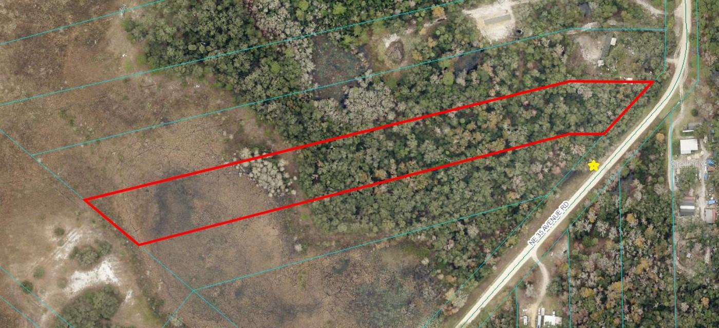 Tranquil 5.29 acres with water features and old Florida like characteristics available in Citra, Florida!  Gorgeous live oaks, palms, and other hardwoods.  Property has view of Black Sink Prairie and is an outdoor enthusiasts dream property...whitetail deer, ducks, turkeys, etc.  A-1 zoning so bring the animals...Mobile homes permitted (No Deed Restrictions).  This unique land offers nutrient rich soils and unmatched privacy.  In a flood zone that would require an elevation certificate for insurance to lower or eliminate flood insurance.  Only 30 minutes to Ocala or Gainesville.  OWNER FINANCING OFFFERED 30% DOWN, 8% fixed interest rate, 5 year term payment $850.19 month or 7 year term $653.53 month.  Buyer to pay Note/Mortgage preparation.