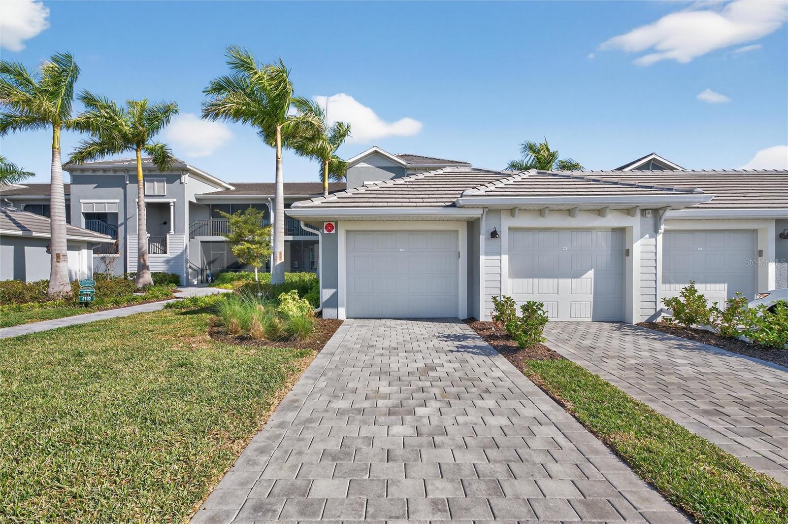 Welcome to Wellen Park Golf &amp; Country Club, one of Southwest Florida’s premier golf
communities. This first-floor/first unit Lennar Veranda condo features the popular DiAngelo II
floor plan and includes a deeded golf membership, a rare opportunity as the builder is now
selling only non-golf condos and all Veranda-style units are sold out.
Ideally situated between the 4th and 5th holes, this home offers peaceful golf course views
complemented by a protected bird sanctuary. A unique feature of this Veranda model is that
the front door is not blocked by the detached one-car garage, allowing you to fully enjoy the
screened front lanai. A second screened lanai in the rear overlooks the golf course and the
sanctuary, providing two inviting outdoor living spaces.
Inside, the open-concept floor plan features 2 bedrooms, 2 bathrooms, and a versatile bonus
room/den that can be used as an office or additional guest space. The large kitchen overlooks
the living and dining areas and includes quartz countertops, stainless steel appliances, and
ample cabinetry including a large kitchen island. Tile flooring runs throughout the entire unit
(no carpet), and the home is enhanced with ceiling fans and abundant natural light.
The primary suite includes two walk-in closets, a separate linen closet, and an en-suite
bathroom with dual-sink vanity and walk-in shower. The second bedroom, located on the
opposite side of the foyer for privacy, is adjacent to a second full bathroom with tub/shower
combination. Hurricane-impact windows with custom-fitted blinds add both convenience and
protection. The condo also includes in-unit full-size laundry appliances.
Residents enjoy quick access to the exceptional amenities at Wellen Park Golf &amp; Country Club,
including a resort-style pool and spa, tiki bar with food and beverage service, golf pro shop,
tennis shop, pickleball courts, tennis courts, bocce ball, dog park, state-of-the-art fitness
center, and day spa, with a future main clubhouse and community restaurant planned. A
satellite pool is also located just a few buildings away.
This guard-gated, golf-cart-friendly community is conveniently located near CoolToday Park,
home of the Atlanta Braves spring training, as well as the vibrant downtown area of Wellen
Park. The beaches and historic charm of Venice, Florida are just a short drive away.
This move-in-ready condo is ideal as a full-time residence, seasonal retreat, or investment
opportunity. Don’t miss the chance to own a golf-deeded Veranda in one of Southwest
Florida’s fastest-growing communities. Schedule your showing today.