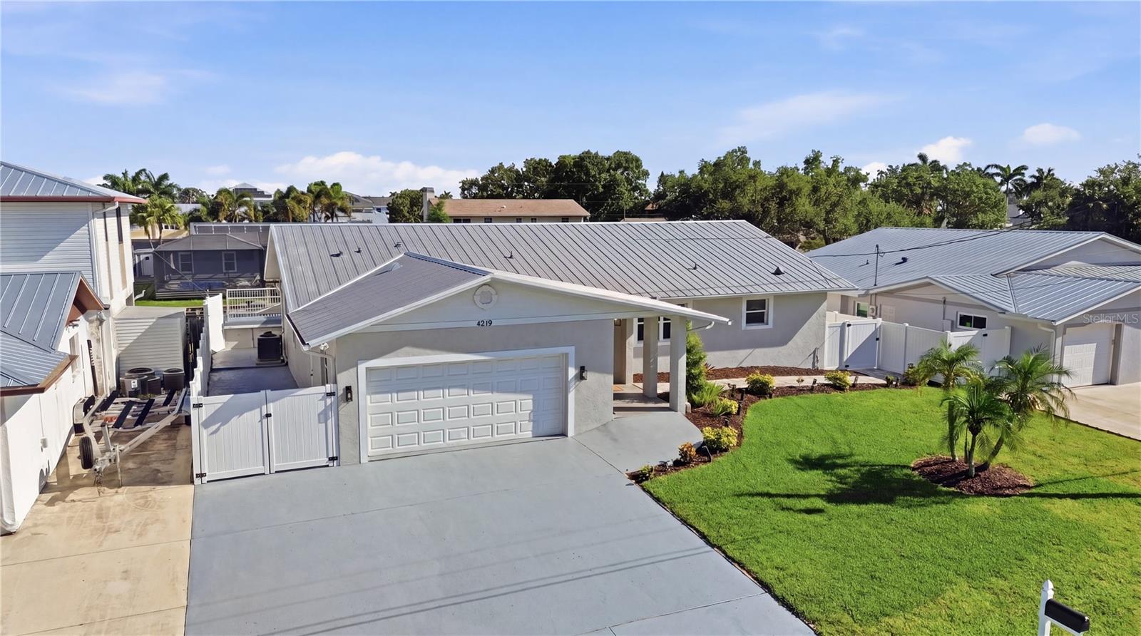Virtually Staged. Completely renovated from top to bottom, this stunning waterfront home offers the ultimate Florida lifestyle with direct boating access to the Manatee River and Gulf of Mexico! Featuring 3 bedrooms, 2.5 bathrooms, and nearly 2,400 square feet of beautifully updated living space, every inch of this home has been thoughtfully redesigned with modern finishes and coastal charm. The open-concept layout is filled with natural light and perfect for entertaining, while the outdoor living areas provide the ideal setting to relax and enjoy breathtaking water views.

Boaters will love the direct canal access with no lock system — offering quick and easy access straight to the open river and out to the Gulf! Best of all, there is NO HOA, so bring your boats, RVs, trailers, and all your toys with no restrictions. Conveniently located near downtown Bradenton, Riverwalk, shopping, dining, I-75, and world-famous Gulf beaches, this move-in-ready waterfront gem is a rare opportunity to enjoy true coastal living without compromise.