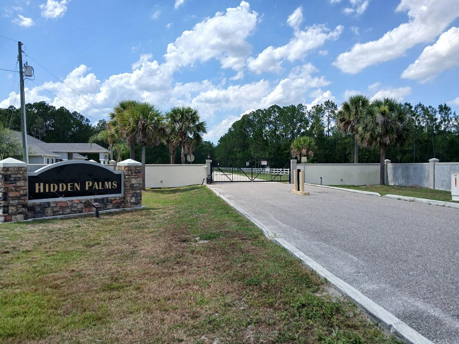 Opportunities like this do not come back, once it is gone, it is gone. Welcome to one of the most extraordinary and irreplaceable land offerings in all of Central Florida: a breathtaking 16+ acre private estate lot nestled inside the exclusive gated enclave of Hidden Palms, where luxury living meets wide-open freedom. This is the largest and most unique parcel currently available in the entire community, there is simply nothing else like it on the market today. Unlike any standard subdivision, Hidden Palms is a true private gated community where only single-family estate homes are permitted, meaning your investment is forever protected by an upscale, low-density neighborhood with no apartments, no townhomes, and no crowding, ever. Horses are welcome here, making this the dream canvas for equestrian enthusiasts between lifestyle and location. Imagine waking up to the sounds of nature, riding your horses at sunrise, then arriving at Walt Disney World in just 20 minutes. Surrounded by natural ponds, lush Florida landscape, and scenic trails, yet minutes from I-4, world-class dining, and international airports, this land delivers the ultimate combination of serenity and convenience that Florida's most discerning buyers spend years searching for. Your dream estate starts here, but only if you act now.