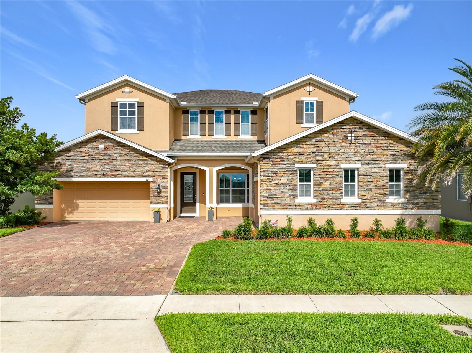 Your forever home awaits you.  Be one of the first new owners of the neighborhoods most sought after Wellington home model.  This 3,800+ sqft home excels in all categories: High ceilings, natural lighting, 8 ft doors throughout the entire property.  The gourmet kitchen includes: Quartz countertops, ducted chimney hood, built-in oven/microwave combo, top of the line Samsung refrigerator (binge watch your next Netflix series from your refrigerator door from your large LCD screen, or download the app and have camera footage of what’s inside your refrigerator at all times so you never have to make an extra trip to the grocer).  The induction cooktop is the must have you never knew you needed, the quick cool technology makes cooking, and clean up a breeze, and keeps little hands safe from burns.

Enjoy family gatherings in the great room with your electric fireplace with color choices to fit any mood.  The oversized master bedroom downstairs features two walk-in closets, a connecting flexroom, and ensuite bathroom with both shower and garden tub for those days you need to just relax and get away.  Speaking of getaways, the master bedroom also includes access to the beautiful screened in lanai facing the stunning Forest Lake Golf course.

The remaining bedrooms are upstairs, all oversized, with an open loft bringing all the family members together for a little fun and entertainment.  A nice feature of this home is the ample storage space found throughout, include 3 car garage.

Nature lovers and fitness enthusiasts will appreciate having the 22-mile West Orange Trail right in the neighborhood. Skip the hassle of driving and unloading bikes; simply step outside and enjoy the convenience of this beautiful local trail.

Commuting is a breeze with quick access to I-4, SR 414, and SR 429 located right nearby. You are perfectly positioned just minutes away from top-rated medical facilities, local dining, shopping, and the world-renowned Disney theme parks. Owning this home provides entry to the priceless experiences life has to offer, this is an opportunity you simply cannot afford to miss!