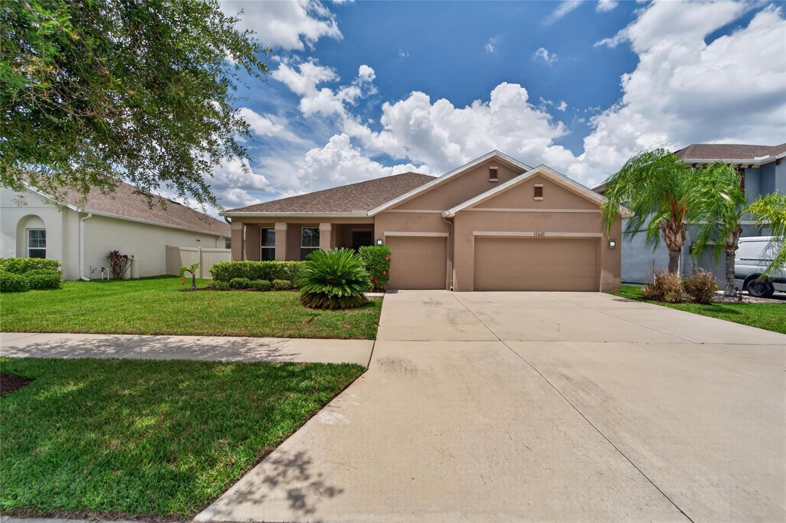 Welcome to this beautiful 4 bedroom, 3 bath home located in the highly sought after Reserve at Pradera community in Riverview. This home offers peaceful views, privacy, and an open concept layout perfect for everyday living and entertaining. The spacious kitchen features a huge center island overlooking the living area along with a built-in bar, creating the ideal space for gatherings with family and friends. The owner’s suite offers a relaxing retreat with his and hers sinks, a soaking tub, and separate shower. Additional upgrades include a brand new AC installed in 2024 for added comfort and peace of mind. Enjoy Florida living year-round from the covered patio. Residents of Reserve at Pradera enjoy resort style amenities including a community pool, playground, basketball courts, and sports fields, all conveniently located near I 75 with easy access to downtown Tampa, MacDill AFB, hiking and biking trails, shopping, dining, and nearby you pick farms.