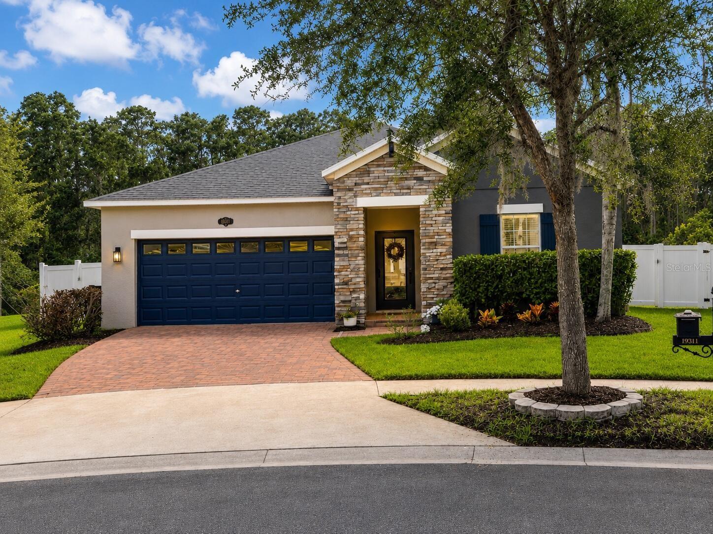 Welcome to your private Florida sanctuary! 

This meticulously maintained 4-bedroom, 3-bathroom modern ranch-style home in the highly desirable K-Bar Ranch community perfectly blends luxury, flexibility, and resort-style living. Nestled on an oversized, private cul-de-sac homesite, the property boasts peaceful conservation and pond views. 

Exquisite Interior Living

Step inside the open-concept layout to find 2,061 square feet of beautifully designed indoor space featuring luxury laminate flooring, custom shiplap tray ceilings, elegant picture-frame molding, and designer lighting. The chef's kitchen is an absolute showstopper, boasting:

* Premium quartz countertops and an oversized center island
* Custom cabinetry and a spacious walk-in pantry
* Subway tile backsplash and Samsung stainless-steel appliances
* Primary Suite: A luxurious retreat featuring a tray ceiling, spa-inspired frameless glass shower, dual quartz vanity, and a custom walk-in closet.
* Guest Suite: A private bedroom with an adjacent full bath
* Flex Space: Dedicated bedrooms - flexibility for a quiet home office, gym, or hobby room.

Unmatched Functional Spaces
* The Ultimate Lanai: Over 600 square feet of covered, screened outdoor living. The east-facing orientation captures soft, dappled morning light for all-day comfort without the harsh afternoon sun-the ultimate setup to spot local deer, otters, and birds.

* Finished Flex Garage: The 400  square-foot finished two-car garage features premium flooring and an EV charging hookup, doubling easily as a home gym, workshop, or game room.

* Green Energy Savings: Equipped with fully owned solar panels to keep your monthly energy costs remarkably low.

Community & Extras
Additional upgrades include a whole-home water softener, custom built-in storage solutions, and access to K-Bar Ranch's resort amenities (clubhouse, fitness center, pool, tennis/basketball courts, and trails).