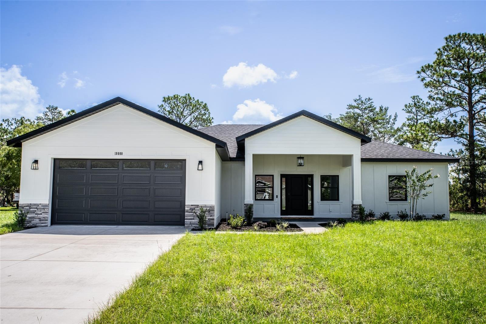 Welcome to the Newly Updated Browne Homes Model on a Paved Road!

Experience Florida living at its finest in this beautifully updated Browne Homes model. Offering over 2,200 square feet of thoughtfully designed living space on  half an acre, this exceptional home combines modern comfort, quality craftsmanship, and timeless elegance.

Step inside to discover an inviting open-concept floor plan designed for both everyday living and effortless entertaining. The gourmet kitchen is the heart of the home, featuring custom white wood cabinetry with soft-close technology, stainless steel appliances, and an expansive center island perfect for gathering with family and friends. Just beyond, sliding glass doors open to a screened and covered lanai overlooking tranquil preserve-like views, creating the ideal setting for outdoor relaxation.

The spacious family room showcases soaring cathedral ceilings and abundant natural light, enhancing the home's bright and airy atmosphere. Retreat to the luxurious primary suite, complete with a spacious walk-in closet and a spa-inspired en-suite bathroom featuring dual vanities, a marble-tiled walk-in shower, and a separate soaking tub.

Designed with privacy in mind, the split-bedroom floor plan places the secondary bedrooms and guest bathroom on the opposite side of the home. The guest bathroom is beautifully finished with stylish subway tile and a convenient tub/shower combination.

Built with quality and efficiency in mind, this home includes a spacious two-car garage with an automatic opener, a dedicated storage area with a 60-gallon water heater, and a 14-SEER HVAC system. Additional upgrades include LED lighting throughout, a RING doorbell, and a full irrigation system to keep your lawn looking its best year-round.

Located in the highly desirable Royal Highlands community, you'll enjoy convenient access to Florida's world-famous white sandy beaches, major highways, shopping, dining, and Tampa International Airport.

Don't miss this opportunity to own a stunning Browne Homes model that perfectly blends style, comfort, and convenience. Schedule your private showing today and discover why this could be your forever home.