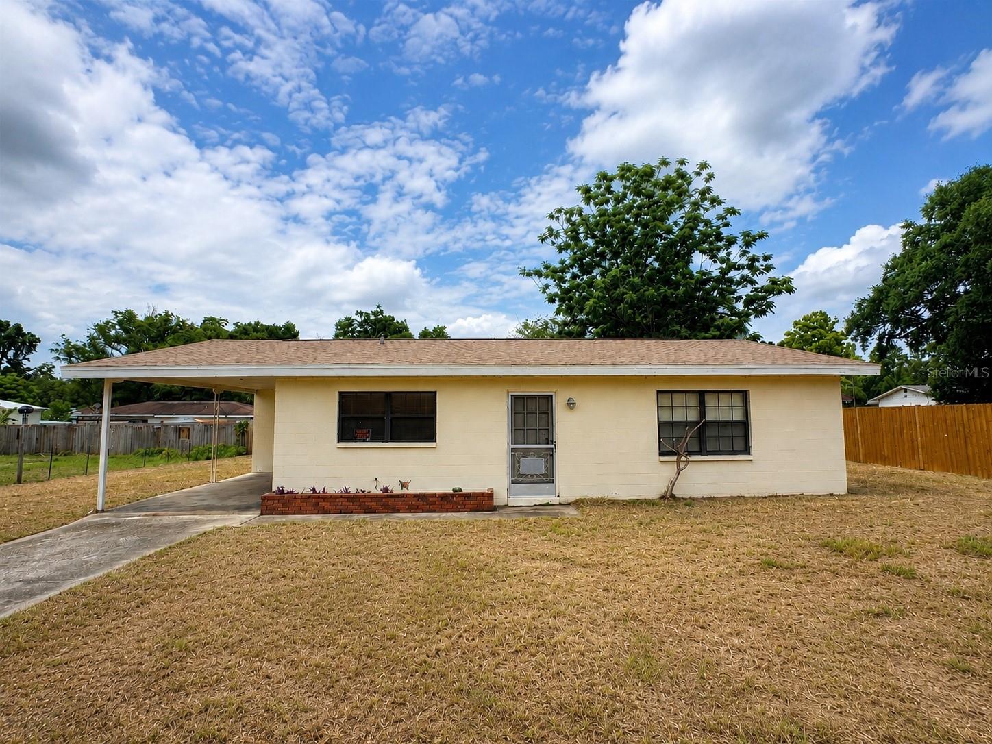 Opportunity and potential come together at 6347 Boxwood St, a 2 bedroom, 1 bathroom home with a carport tucked into an area that offers a more rural feel while still providing convenient access to everyday essentials. Enjoy the balance of quieter surroundings while remaining just a short drive from shopping, dining, grocery stores, and major roadways. With a functional layout, this property presents an excellent opportunity for an investor, renovator, or buyer looking to create their own vision and build long term value. The property’s roof was replaced in 2015. The chimney was removed at that time as well. Despite the home’s cosmetic and dated appearance, significant improvements have already been completed behind the scenes over the years. The property has been updated with a newer 200 amp electrical service panel, updated Romex wiring, and a re-pipe of the water lines completed in 2017, providing important system upgrades for future ownership.

The home includes a rear utility room housing the washer and dryer hookups, electric panel, and water heater, while the back slab patio provides additional space ready to be reimagined into an outdoor living area, screened patio, or future expansion potential. The property is serviced by septic. 

Please note there is currently no AC system or ductwork, and utilities will need to be connected through the electric company. Whether you are searching for your next project, investment opportunity, or a property to renovate and personalize, this home offers strong upside potential at an approachable entry point.