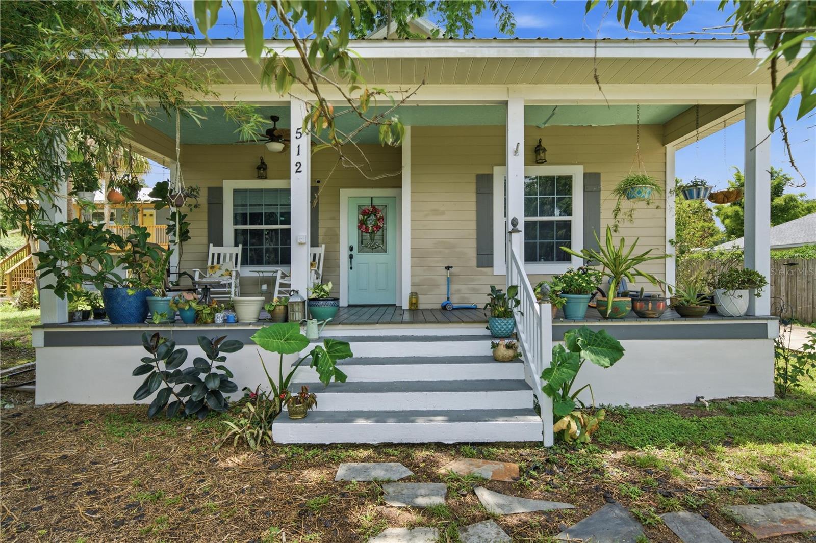Come to this beautifully restored 4-bedroom, 2.5-bath, two-story home one block from Ocala's Historic District. Completely rebuilt in 2007 while preserving the charm and architectural character of the historic district., this home seamlessly blends timeless appeal with modern convenience. Inside, you'll find bamboo flooring throughout the first floor, luxury vinyl flooring upstairs, and ceramic tile in the kitchen and bathrooms. The spacious kitchen features granite countertops, stainless steel appliances, and plenty of cabinet space and large pantry. Granite countertops in all bathrooms throughout the home. High ceilings on the main level create an open, airy feel, while generously sized walk-in closets provide ample storage. Major updates include a newer roof and A/C system, smart home features such as a Nest thermostat, programmable front door lock, color-changing exterior floodlights, and smart smoke/carbon monoxide detectors. Outdoor exterior is impressive, with a welcoming front porch, rear porch, second-story balcony, and a paver patio complete with a barbecue area. Included is a detached storage building which offers a charming front porch and two interior lofts for exceptional storage or workshop space. Relax beside the tranquil pond with waterfall with convenient automatic settings connections. The lush, landscaped yard is designed for both beauty and privacy, featuring non-invasive clumping bamboo, mature fruit trees including peach, lemon, grapefruit, and blackberry, plus a wood privacy fence with a double-gate entrance. Located just minutes from Downtown Ocala, enjoy easy access to the popular farmers market, restaurants, shopping, entertainment, and community events. Highly rated elementary and middle schools are also just minutes away, making this exceptional property the perfect place to call home. Don't miss this forever home!!!!