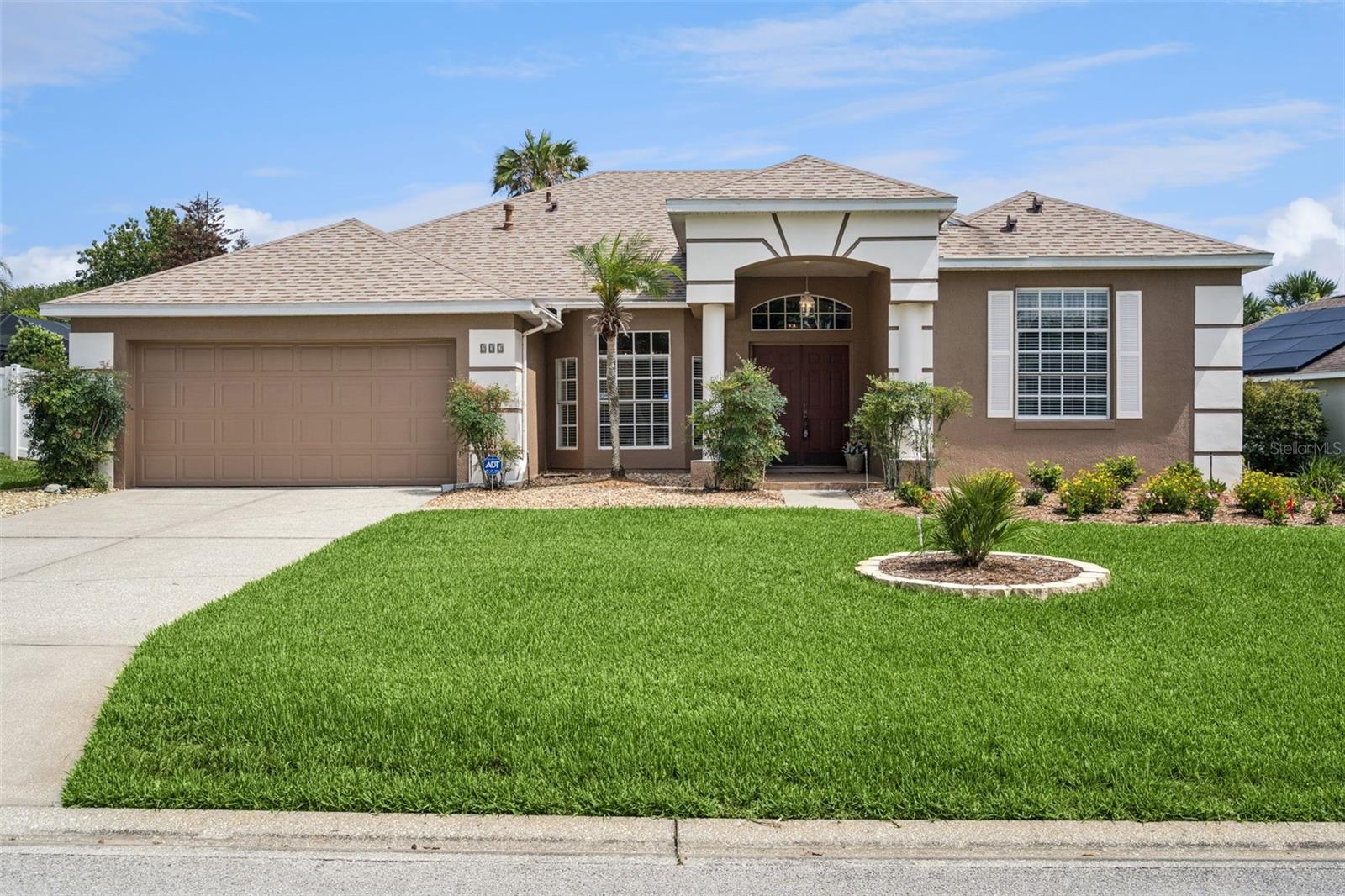 Welcome to this beautifully maintained single-story home in Loma Del Sol, proudly offered by its original owners. Located on a generously sized homesite offering exceptional outdoor space, this property combines comfort, functionality, and value in one of Davenport's most established communities.

A welcoming double-door entry opens to a spacious floor plan designed for everyday living and entertaining. The kitchen features quartz countertops, natural gas cooking, and ample workspace, while the adjoining living and dining areas provide plenty of room to gather with family and friends.

The primary suite offers a private retreat with a separate sitting area that can serve as a nursery, home office, exercise space, or flex room to fit your lifestyle. Additional bedrooms and living spaces are thoughtfully arranged, making the home feel both comfortable and practical. 

Step outside to enjoy the large screened lanai complete with a relaxing hot tub and convenient access to the pool bath. The oversized homesite provides abundant outdoor space, while the extended driveway offers ample parking for residents and guests alike. A storage shed adds even more versatility and convenience.

Additional highlights include natural gas service, low HOA fees, and more. Ideally located near shopping, dining, major highways, world-famous attractions, and everyday conveniences, this home offers the perfect blend of location, space, and affordability. Major components have been updated.

Schedule your private showing today.