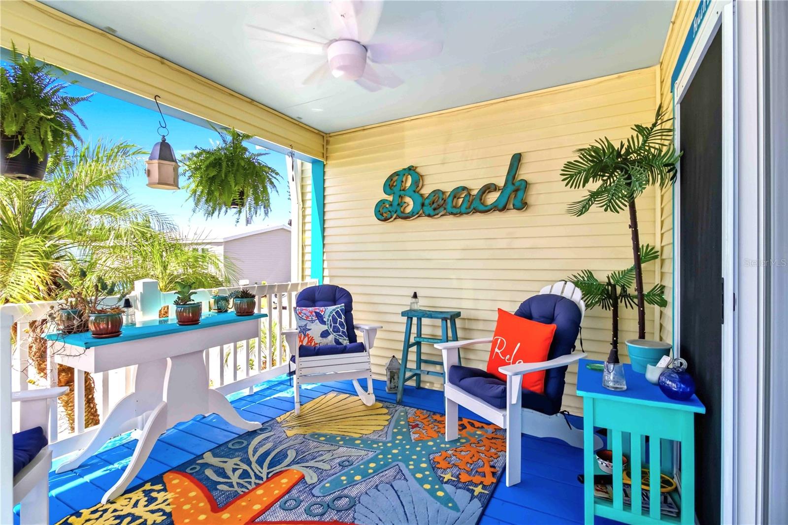 Step into this absolutely adorable 2-bedroom, 2-bath LAND OWNED - beachy cottage-style home. Offered FULLY TURN-KEY FURNISHED in the 55+ area of Fair Lane Acres. The HOA fee is only $135 / month and includes WATER, SEWER and AMENITIES. This is a PET FRIENDLY community, bring Fido and Fifi. You can start enjoying the Florida lifestyle from day one with no worries about buying anything to get settled. From the grill to the beach towels, the pots and pans to the patio furniture; everything is already in place… just bring your flip flops.

Built in 2014 and thoughtfully elevated off the ground, this home combines newer construction with peace of mind and style. Inside, you’ll love the bright, airy feel, enhanced by tropical plantation shutters and a seamless flow throughout.
Be sure to check out the 3D Matterport tour under virtual links to take a walk through virtually! 

The kitchen is both functional and inviting, featuring tall cabinetry, a breakfast bar, and space for an eat-in dining area - perfect for casual mornings or entertaining guests.

The split floor plan offers privacy, with a spacious primary suite tucked away from the guest bedroom. Enjoy your own retreat complete with an en-suite bath, generous storage, and a large walk-in closet.

Step outside and you’ll quickly see what makes this home special. The lush, meticulously maintained landscaping creates a welcoming, tropical setting - truly a must-see. Relax on the front porch with its hurricane-impact slider or take advantage of the large carport and attached storage room, perfect for beach gear, bikes, and all your Florida toys.

And it gets even better - the low HOA fee includes water and sewer, and gives you access to the community pool and amenities.

 This one is the total package—charming, move-in ready, and designed for easy coastal living.
 Schedule your showing today before it’s gone!