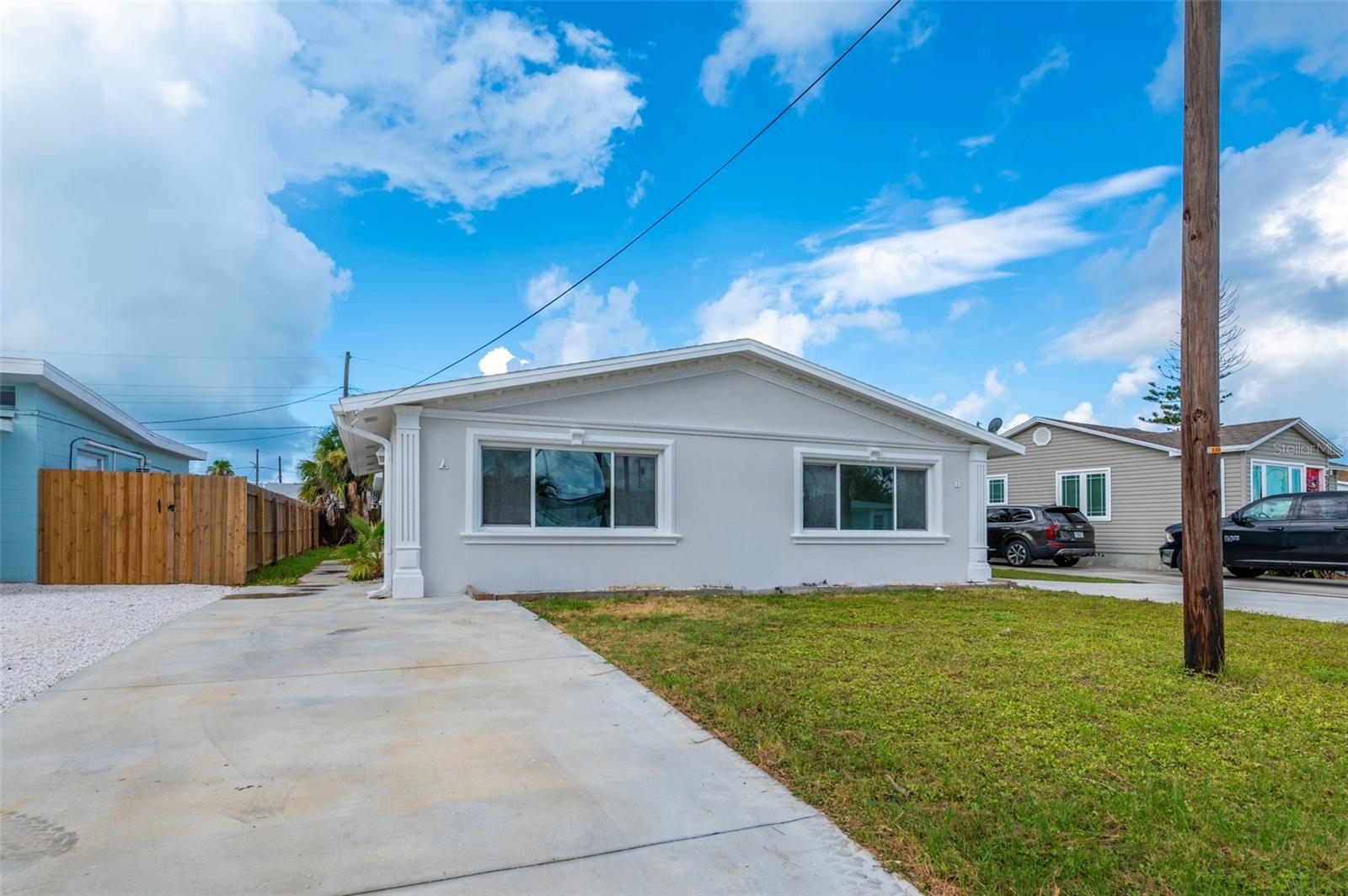 Newly renovated Madeira Beach duplex with excellent income potential and added flexibility! This updated property features two existing units plus a detached rear room/building that may offer additional possibilities for storage, office, guest space, or potential future use, subject to zoning, permitting, and buyer due diligence. Recent improvements include new HVAC, new electrical, new electrical panels, new kitchens, fresh interior/exterior paint, and new appliances, making this a strong turnkey-style opportunity in one of the area’s most desirable beach communities. Located just minutes from the Gulf beaches, John’s Pass, restaurants, shopping, boating, and entertainment, this property is ideal for investors, owner-occupants, or buyers seeking rental income near the coast. Whether held as a long-term rental, used as an owner-occupied property with income potential, or explored for expanded future use, 14036 Margueritte Dr offers a rare opportunity in Madeira Beach. Buyer to verify all zoning, permits, rental restrictions, flood zone information, room counts, and any potential triplex or additional-unit use with the City of Madeira Beach and appropriate authorities. Current use is being marketed as a duplex with additional rear building potential.