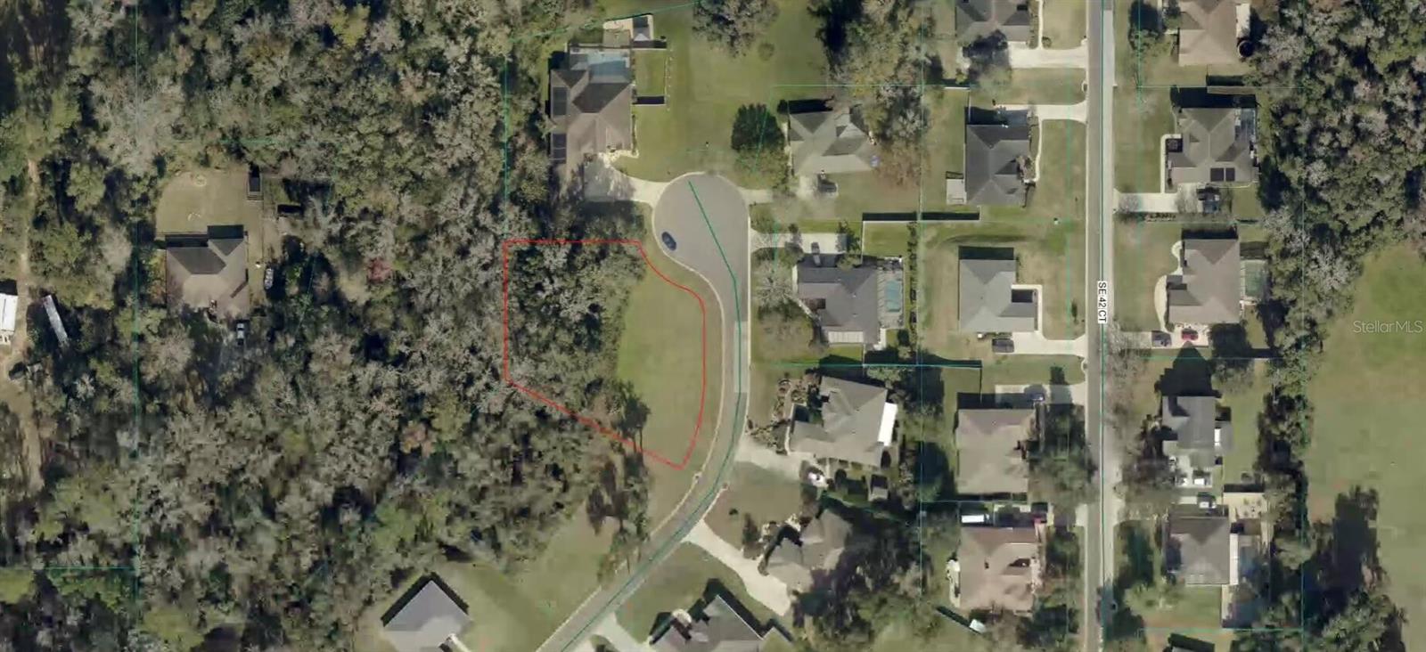Gorgeous 1/2 acre lot located in Cobblestone!! A rare find for sure. Located in a cut-de-sac, this beautiful lot is a perfect setting for your dream home. This is in a GATED COMMUNITY and is minutes from shopping, The Villages, Ocala and all that this part of Florida has to offer. Not in a flood zone with lots of space!