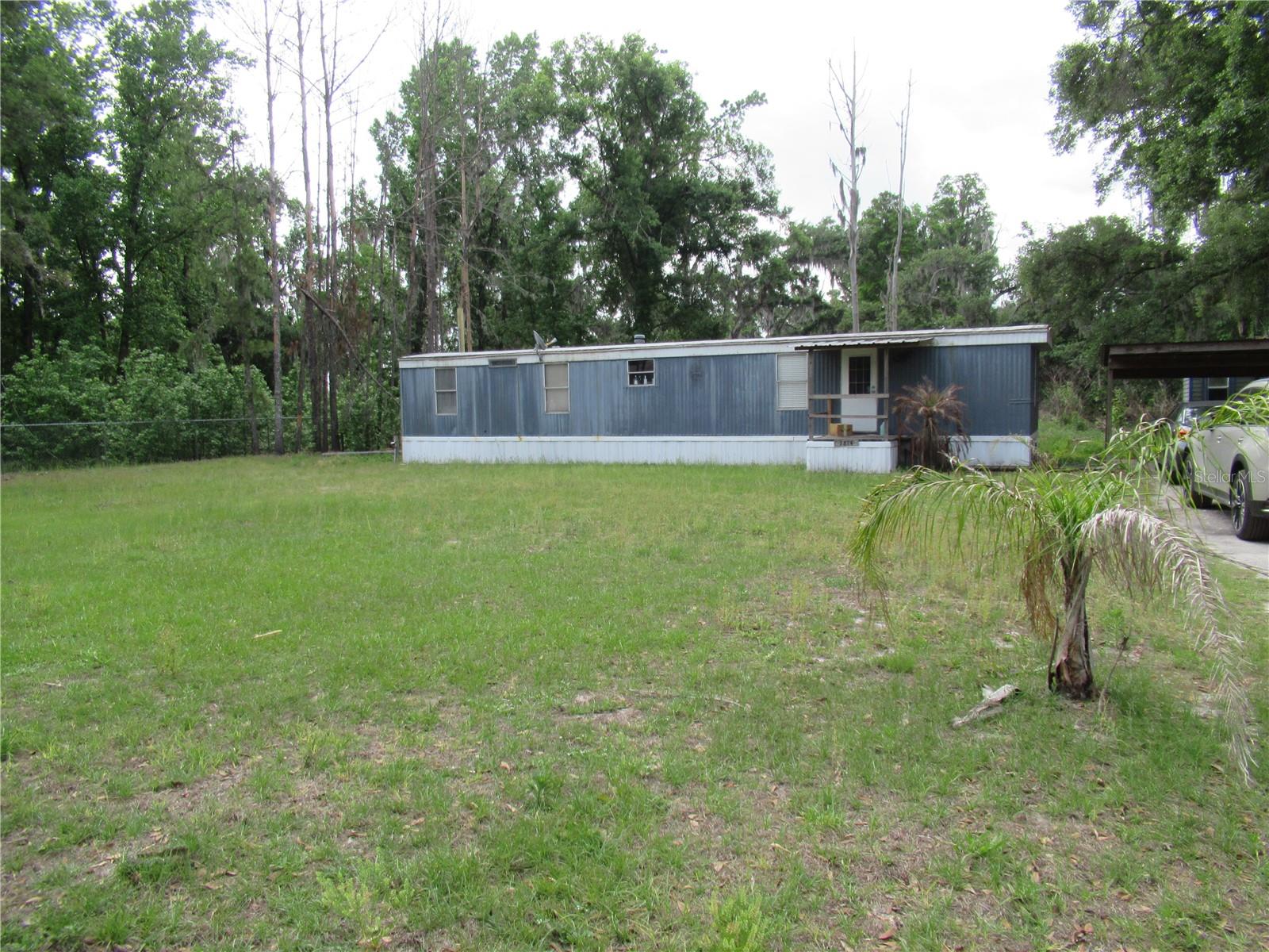 Short Sale. "Short Sale"  Charming Rural Home with Pond and Acreage
Discover the perfect blend of tranquility and rural living in this delightful home, ideally suited for those seeking land with a pond.
Property Features Pond: The property includes a 25-foot by 40-foot pond, fully stocked with bluegill and bass. Enjoy fishing from the dock, making it a wonderful spot for relaxation and recreation. Land Size: Spanning 2.33 acres, this spacious lot provides ample room for outdoor activities and privacy. Home Layout: The residence features a split floor plan with two bedrooms and one and a half bathrooms, offering both comfort and functionality. Modern Utilities: The air conditioning, water softener, washer, and dryer are all just three years old, ensuring reliable and efficient performance. Additionally, a new meter box has been installed.
Farm-Friendly: Bring your farm animals and embrace the peaceful, quiet, and private atmosphere of rural life.
Zoning: The property is zoned AS-1, supporting agricultural and residential uses.