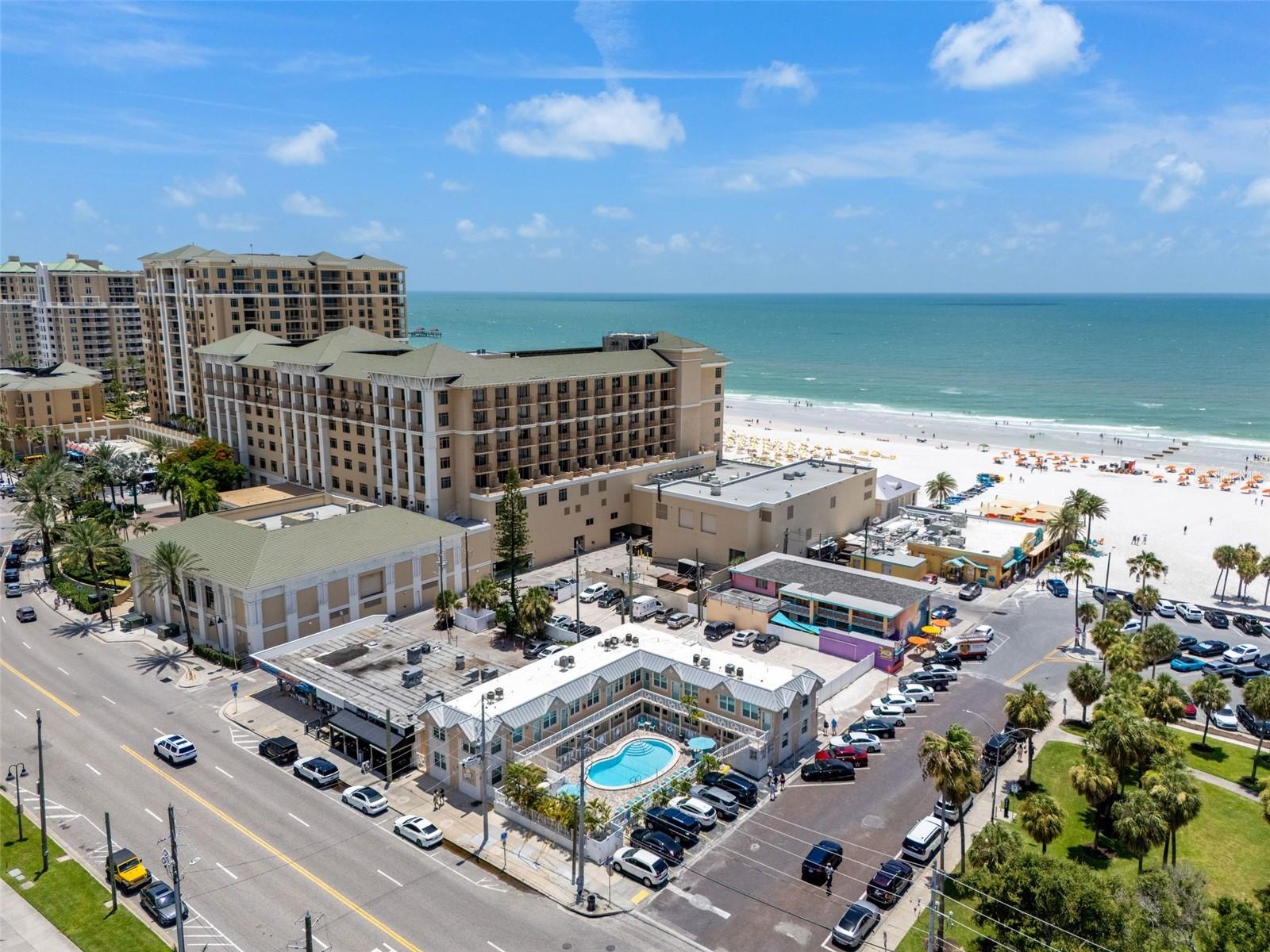 Experience the ultimate beach lifestyle and investment opportunity at this beautifully updated condo located just steps from the sugar-white sands of world-famous Clearwater Beach. Situated in the highly desirable Clearwater Beach Suites/La Sal Suites complex, this property offers the rare advantage of short-term rental eligibility, allowing rentals as short as 1–7 days, making it ideal as both a personal vacation retreat and an income-producing investment. Perfectly positioned in the heart of North Clearwater Beach, the condo is within walking distance of restaurants, shops, entertainment, the marina, and the iconic Pier 60, while the beach is only a few steps away. Owners and guests enjoy the convenience of a boutique-style complex with a heated pool and a prime location that consistently attracts vacationers year-round. RECENT UPGRADES INCLUDE: NEW APPLIANCES, NEW PLANK TILE FLOORING, NEW KITCHEN COUNTERTOPS, NEW KITCHEN CABINETS, NEW BASEBOARDS, NEW SOLID WOOD DOORS, and NEW ELECTRICAL OUTLETS. CONDO FEE INCLUDE ALL UTILITIES except electric.  This a a turnkey short term rental opportunity on one of the most popular beaches in all of North America.  Contact me today for a private showing!