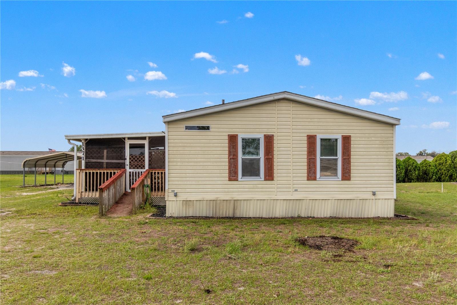 Welcome to this charming home located in the community of Montgomery Acres in Lake Panasoffkee! Situated on a spacious .35-acre lot, this 2-bedroom, 2 bath home offers a great opportunity for affordable living. This home features a functional layout that creates a warm and inviting atmosphere perfect for both relaxing and entertaining. The primary suite includes a full bath The property provides ample outdoor space for relaxing, entertaining under the covered porch or storing your recreational toys under the carport. With just minutes from Lake Panasoffkee, known for some of the best freshwater fishing in Central Florida, you'll have easy access to boating, bass fishing, and enjoying the natural beauty of the area. Also, conveniently located near I-75, making for an easy commute to nearby towns and amenities. So, schedule a showing today and go fishing tomorrow!