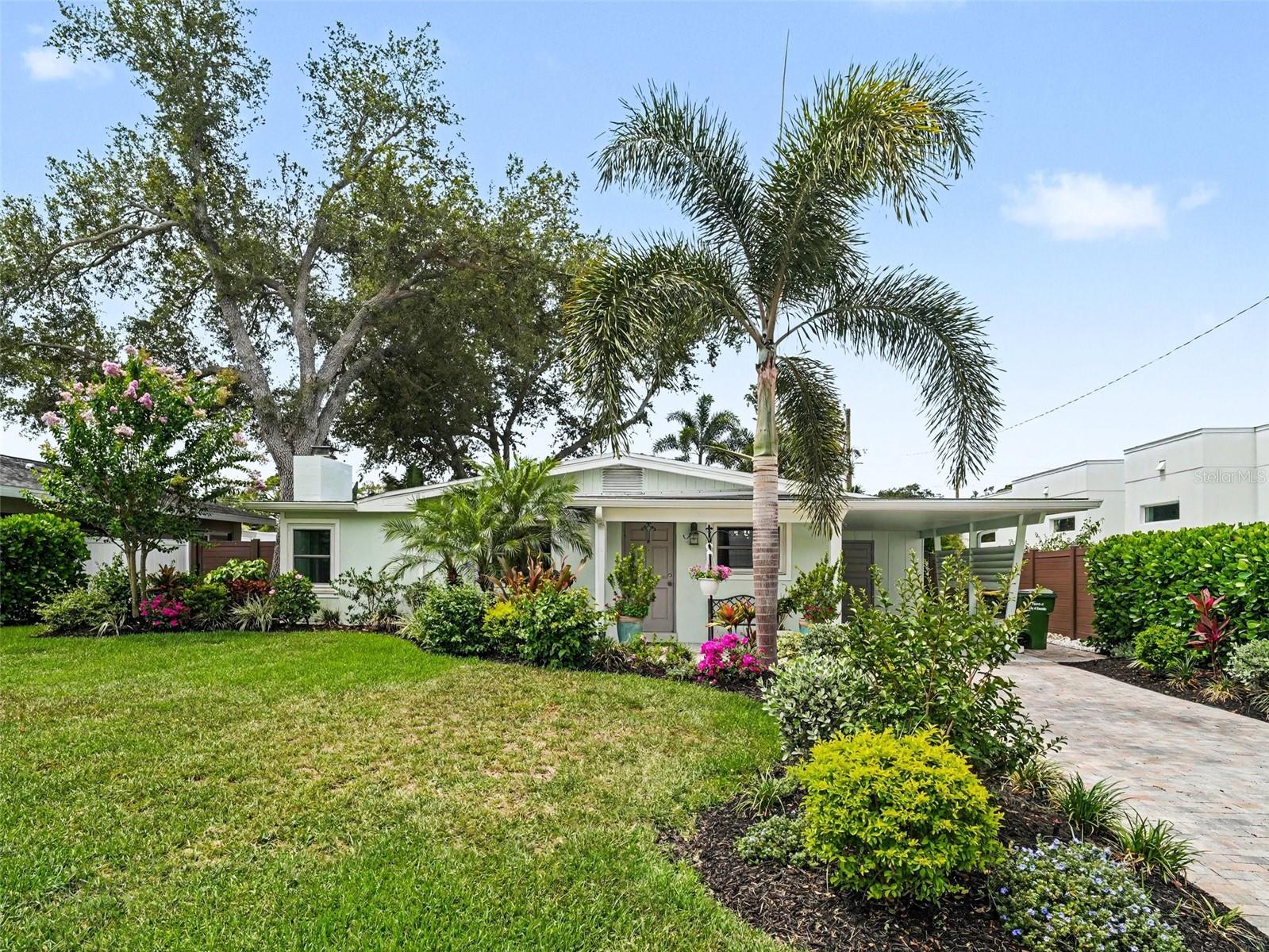 Beautifully maintained 3-bedroom, 2-bath Sarasota home in a highly desirable location just minutes from downtown Sarasota, Sarasota Memorial Hospital, Southside Village, Midtown Plaza, Arlington Park, and the Legacy Trail. In addition to the square footage reflected in the public tax record, the home also offers an enclosed Florida room, creating a more spacious and flexible layout.
Inside, you’ll find a cozy living room fireplace, a recently updated bathroom, and a versatile casita-style/mother-in-law-style suite ideal for guests, extended stays, a private office, studio, or additional everyday use. The roof was replaced in 2024, and the home features impact doors and windows offering added peace of mind.

Step outside to a beautifully landscaped backyard designed for relaxing and entertaining. The covered patio features recessed lighting, creating a warm and inviting outdoor living area, while the side yard includes a storage shed for added convenience.

Location is a major highlight — approximately 5.5 miles to Lido Key Beach and approximately 6 miles to Siesta Key Beach, placing you close to two of Sarasota’s most beloved coastal destinations. Arlington Park & Aquatic Center is also nearby, offering pickleball and tennis courts, basketball courts, playgrounds, walking paths, dog-friendly areas, swimming pools, and community events.

An exceptional opportunity to enjoy the Sarasota lifestyle with flexible indoor space, beautiful outdoor areas, and easy access to beaches, downtown, shopping, dining, and recreation.
