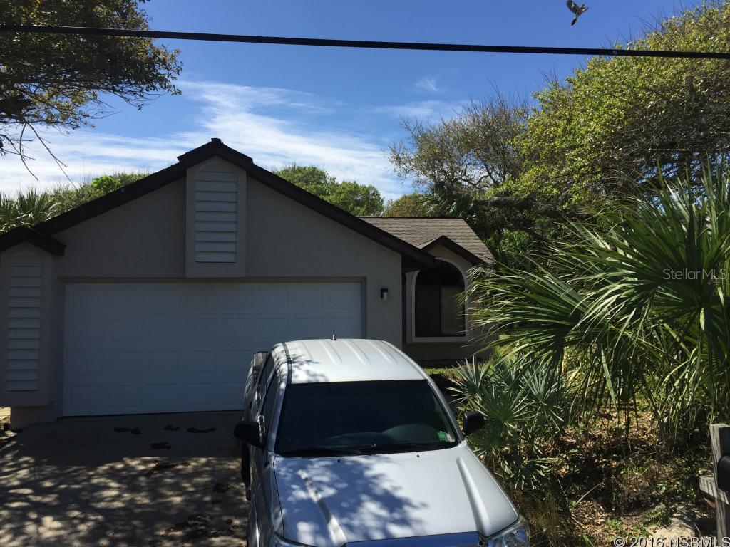 Great beachside location, 2 blocks from Flagler Ave. restaurants and shops and just 5 houses from the beach! Updated 2/2 with new paint, wood-look ceramic tile throughout and inside laundry room. Vaulted ceilings, open floor plan, and spacious 2-car garage for all the beach "toys". Treed lot for shade and privacy with large wooden deck for entertaining. 12 month lease.  1 restricted pet allowed with pet deposit and additional monthly fee. Available May 1, 2016