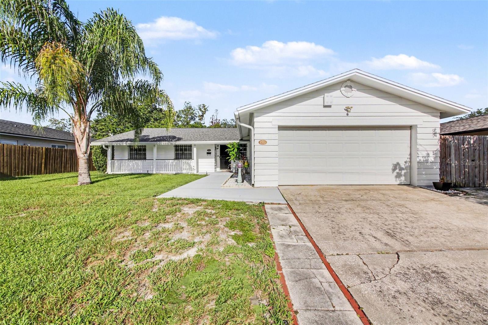 Don't miss this opportunity to own a beautifully updated home with a sought-after Winter Park address! Priced to sell, this move-in-ready 3-bedroom, 2-bath home offers the perfect combination of comfort, style, and location. Enjoy being just minutes from Park Avenue, Baldwin Park, Cady Way Park and Trail, Winter Pines Golf Club, shopping, restaurants, and major roadways, making it easy to enjoy everything Winter Park and the surrounding area have to offer. Inside, you'll love the open floor plan that's perfect for everyday living and entertaining. The updated kitchen features quartz countertops, stainless steel appliances, a large single-basin sink, beautiful cabinetry, and plenty of counter space. It opens to the spacious dining area and family room, creating a bright and welcoming space where everyone can gather. Tile flooring is featured in the foyer, kitchen, bathrooms, and the large open living area just off the kitchen, while warm wood flooring flows through the formal dining room, family room, hallway, and all three bedrooms for a clean, updated look. The primary suite offers a spacious closet and an oversized walk-in shower designed for comfort and convenience. Step outside to the oversized screened lanai overlooking a fully fenced backyard that's perfect for entertaining, pets, play, or simply relaxing after a long day. A large storage shed provides plenty of room for lawn equipment, tools, bikes, or seasonal storage. Recent updates include a 2021 roof and 2022 HVAC system, giving the next owner added peace of mind. Security bars on the windows provide an extra layer of protection and may qualify for insurance discounts. If you've been looking for an updated home in Winter Park that offers great value, this is one you won't want to miss!