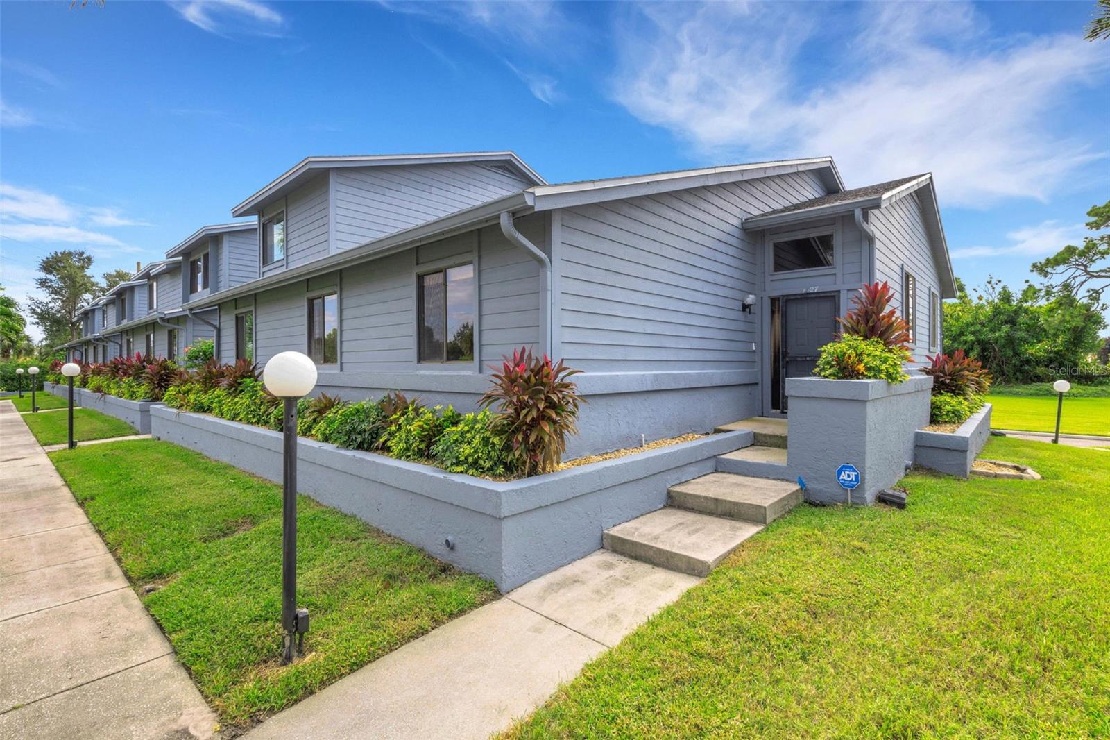Short Sale. Don’t miss this short sale opportunity in a quiet, well-maintained community just minutes from the beach. This desirable end-unit condo features 2 bedrooms, 2 baths, and a 2-car garage—a rare combination in a small complex of only 13 total units.  Enjoy the added privacy and natural light that comes with being an end unit, along with a convenient location close to shopping, dining, and local attractions. This property offers an excellent chance to own a slice of coastal living in a peaceful setting.  Property being sold as-is.