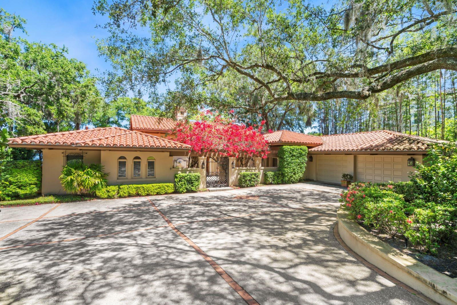 Indulge in lakeside luxury at this captivating residence in the heart of Winter Park. Discover the epitome of elegance with this stunning lakefront home boasting unparalleled views of Lake Maitland, part of the illustrious Winter Park Chain-of-Lakes. Step into a world of refined living as you're greeted by a beautiful courtyard entrance, setting the tone for the grandeur that lies within. This meticulously designed home offers an impressive layout featuring three bedrooms, three full baths, two half baths, and a spacious study/den, providing ample space for relaxation and productivity. Entertain in style in the formal living room, where panoramic windows frame picturesque vistas of the glistening lake. The chef's kitchen is a culinary haven, equipped with top-of-the-line appliances and adorned with stylish finishes. Unwind in the tranquility of the outdoors as you step onto the patio and take in the breathtaking lake view, surrounded by lush landscaping and the soothing sounds of nature. Whether it's a quiet evening under the stars or a lively gathering with friends and family, this outdoor oasis offers the backdrop for every occasion. Embrace the desired lifestyle of lakefront living, with the added convenience of being within walking distance to Park Avenue. Explore the charming boutiques, exquisite dining options and cultural attractions that await just moments from your doorstep. Don't miss this rare opportunity to experience the ultimate blend of luxury, convenience and natural beauty.