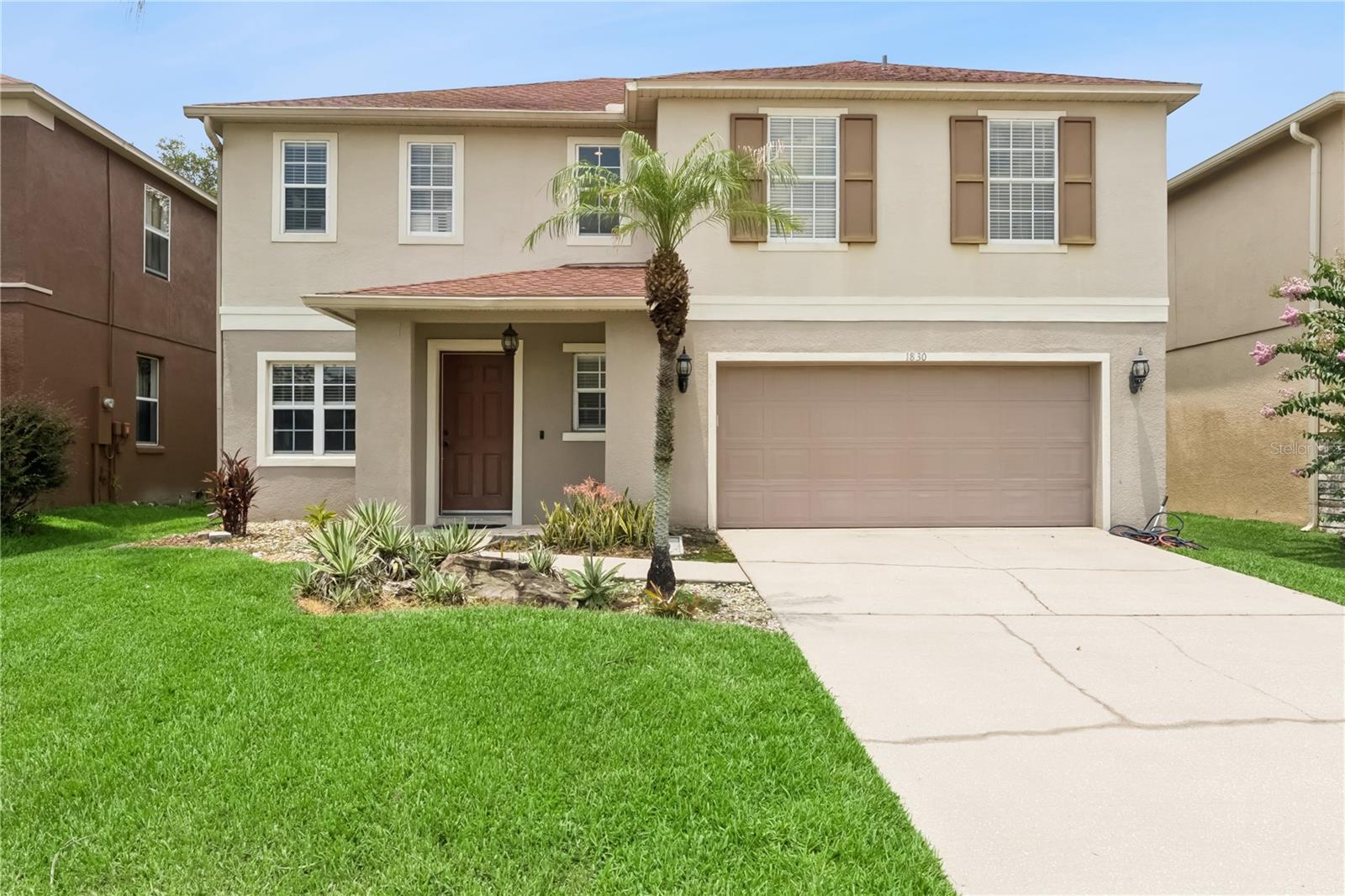 Welcome to the gated Emerald Ridge neighborhood that is conveniently located near the 429, Turnpike, shopping and restaurants in Winter Garden, Horizon West and Windermere as well as the charming downtown Winter Garden Plant Street and all of the local activities it brings.  Cool off in the COMMUNITY POOL and enjoy staying active on the sidewalks that run throughout the neighborhood.  This home has an OPEN FLOOR PLAN that greets you as soon as you enter.  The spacious living room has nice natural lighting and opens to the eat-in kitchen which was recently remodeled.  You’ll find NEW CABINETRY with soft-close doors, a TILE BACKSPLASH and STAINLESS STEEL appliances.  The WALK-IN PANTRY is a dream as it gives storage space for kitchen wares and laundry needs.  Sliding doors open to the SCREENED PATIO so you can enjoy the evening breeze.  There’s a SPACIOUS LOFT upstairs which makes for a fantastic 2nd living room, home office, play space, or home gym.  The primary suite in this model is extra large giving room for a sitting area!  The WALK-IN CLOSET offers plenty of space to keep your wardrobe organized and the en-suite bathroom has a garden tub and separate shower.  The secondary bedrooms share a hall bathroom.  The ROOF, AC, AND WATER HEATER WERE REPLACED IN 2018.  Additional upgrades include CROWN MOLDING and canned lighting throughout the home.